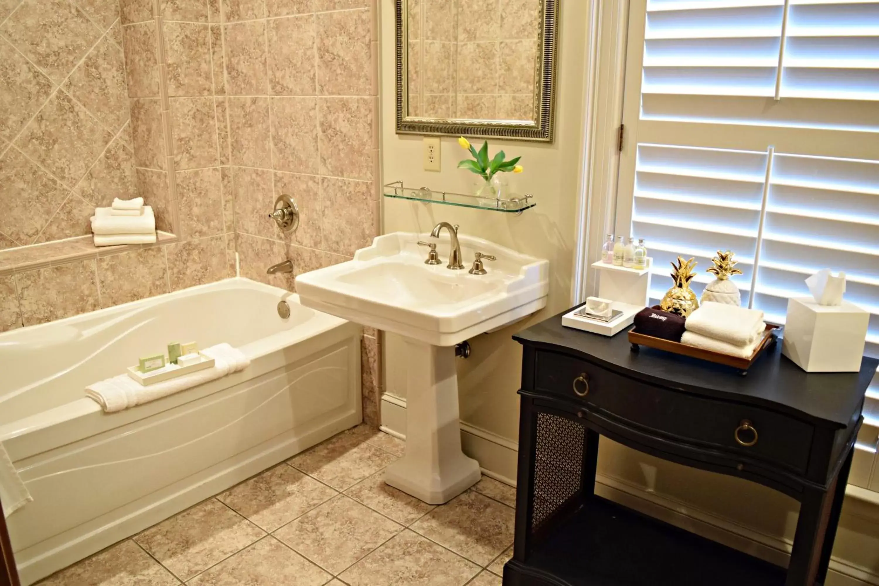 Bathroom in JH Adams Inn, Trademark Collection by Wyndham