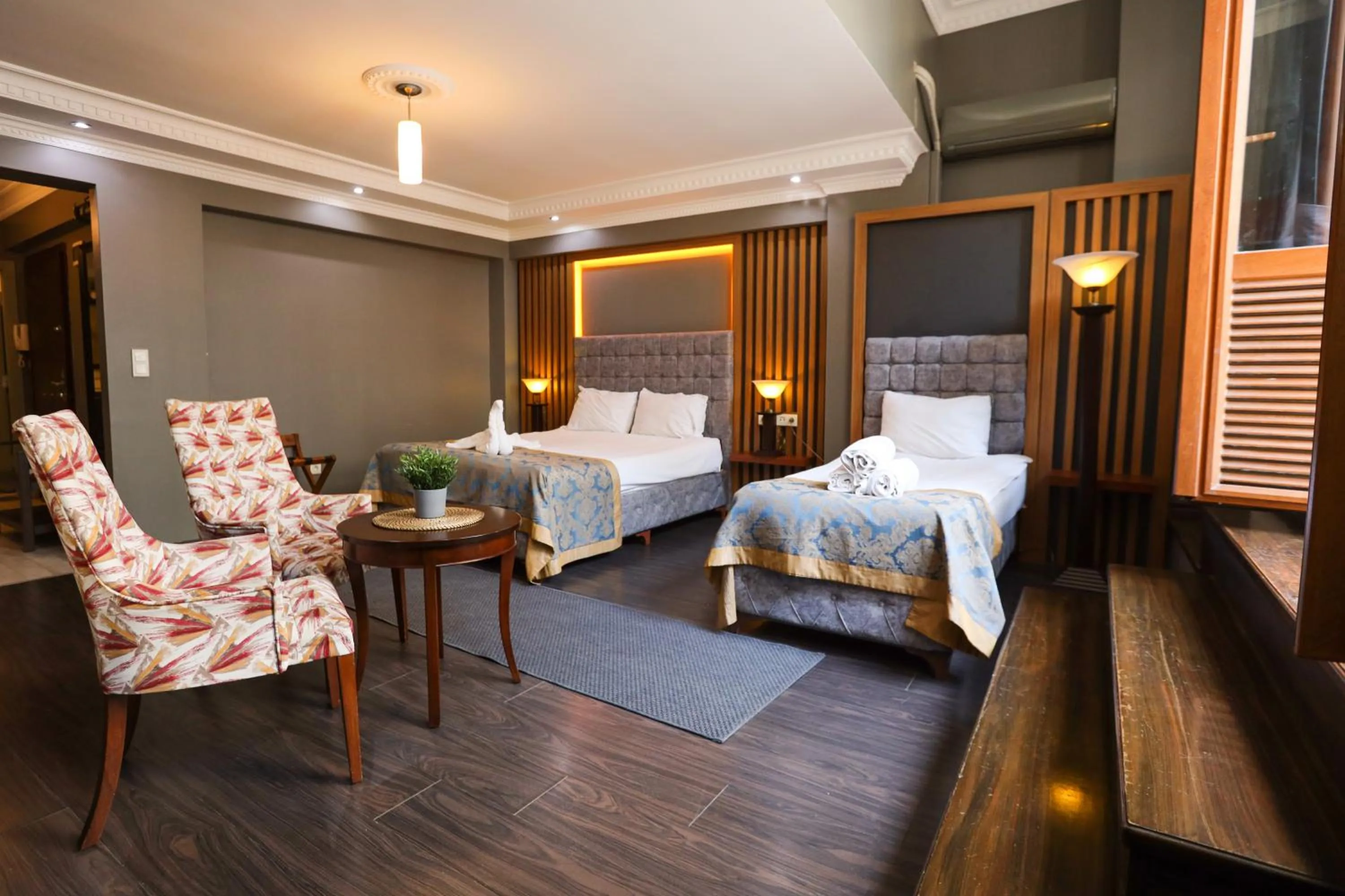 Seating area, Bed in Cumbali Luxury Boutique Hotel