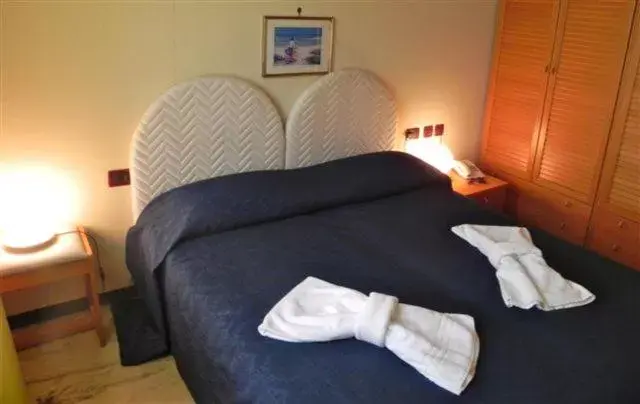 Bed in Torreata Hotel & Residence
