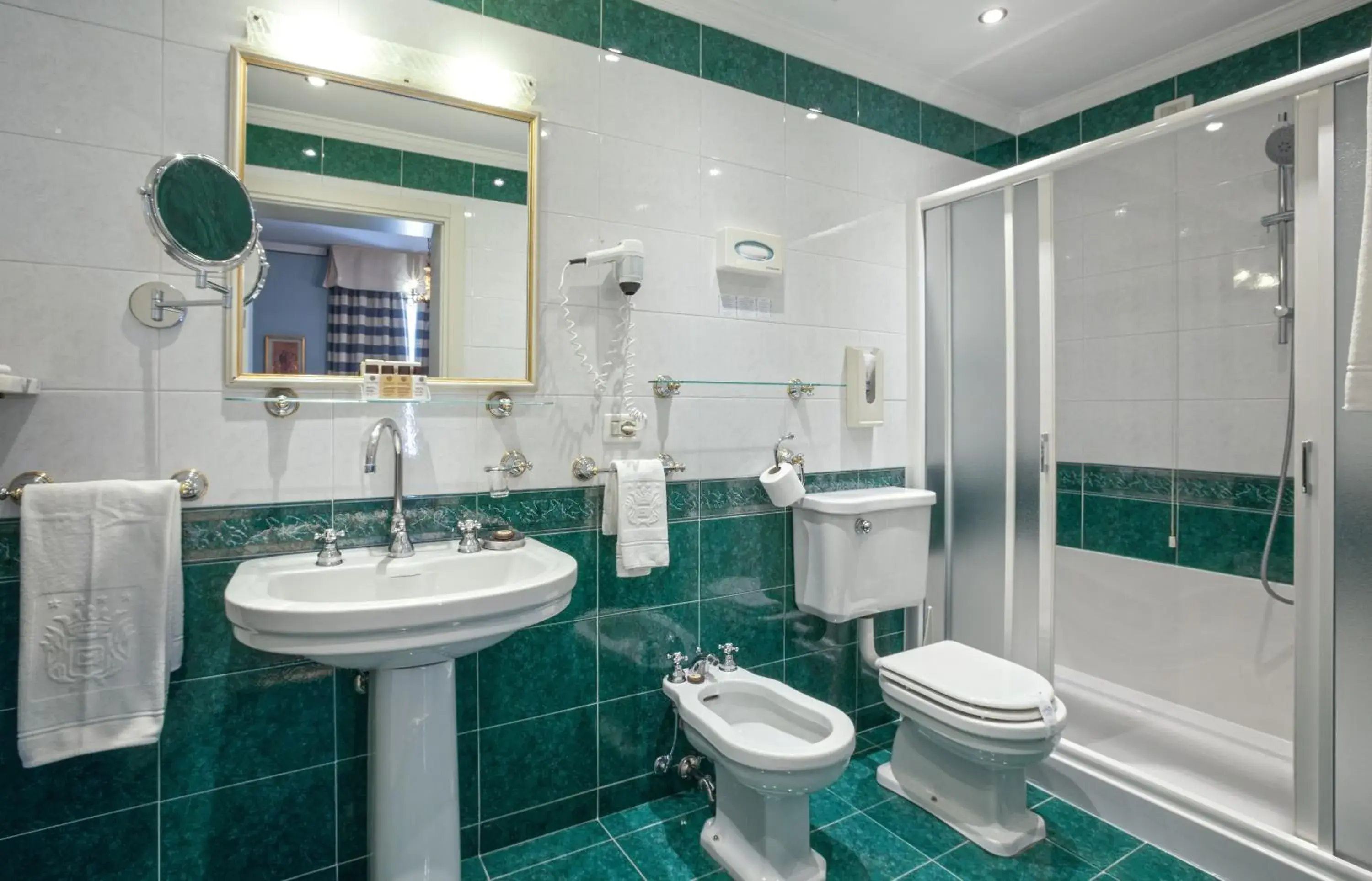 Bathroom in Hotel Quisisana Terme Bathroom in Hotel Quisisana Terme