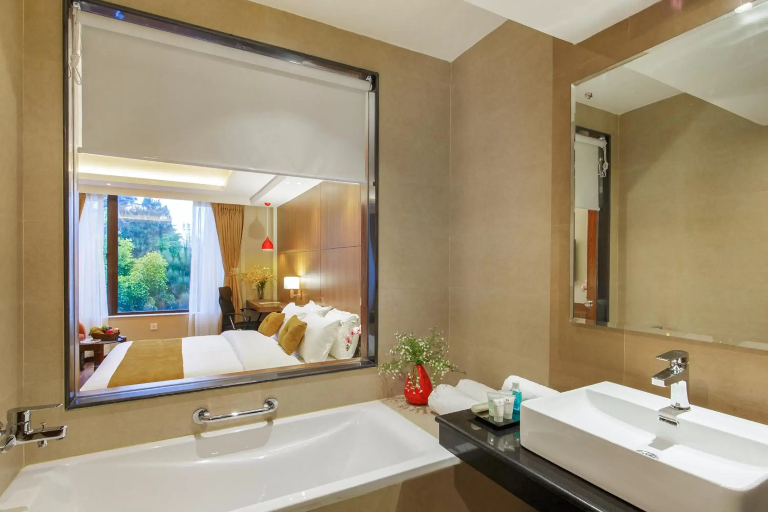 Bathroom in Hotel Thrive, A Tropical Courtyard Bathroom in Hotel Thrive, A Tropical Courtyard