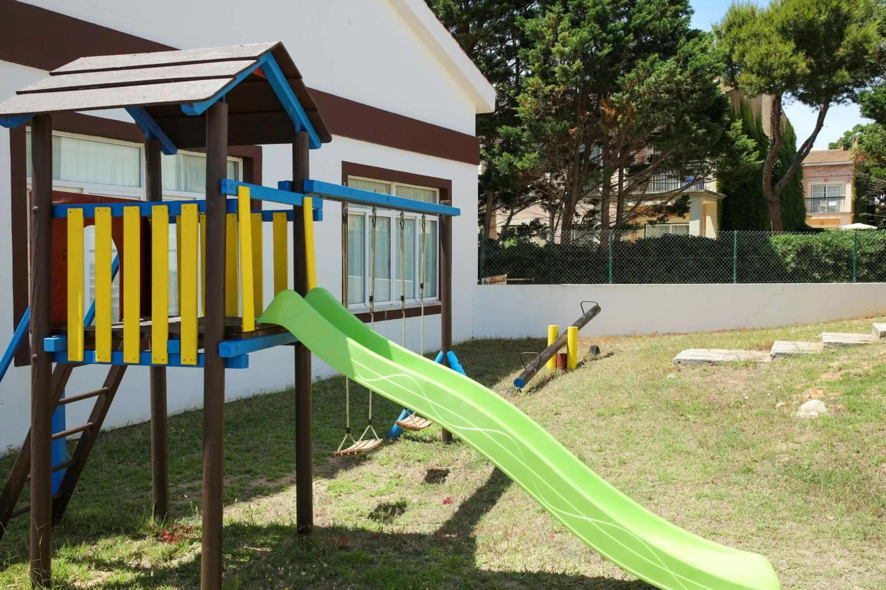 Garden view, Children's Play Area in Nuramar Resort & Villas