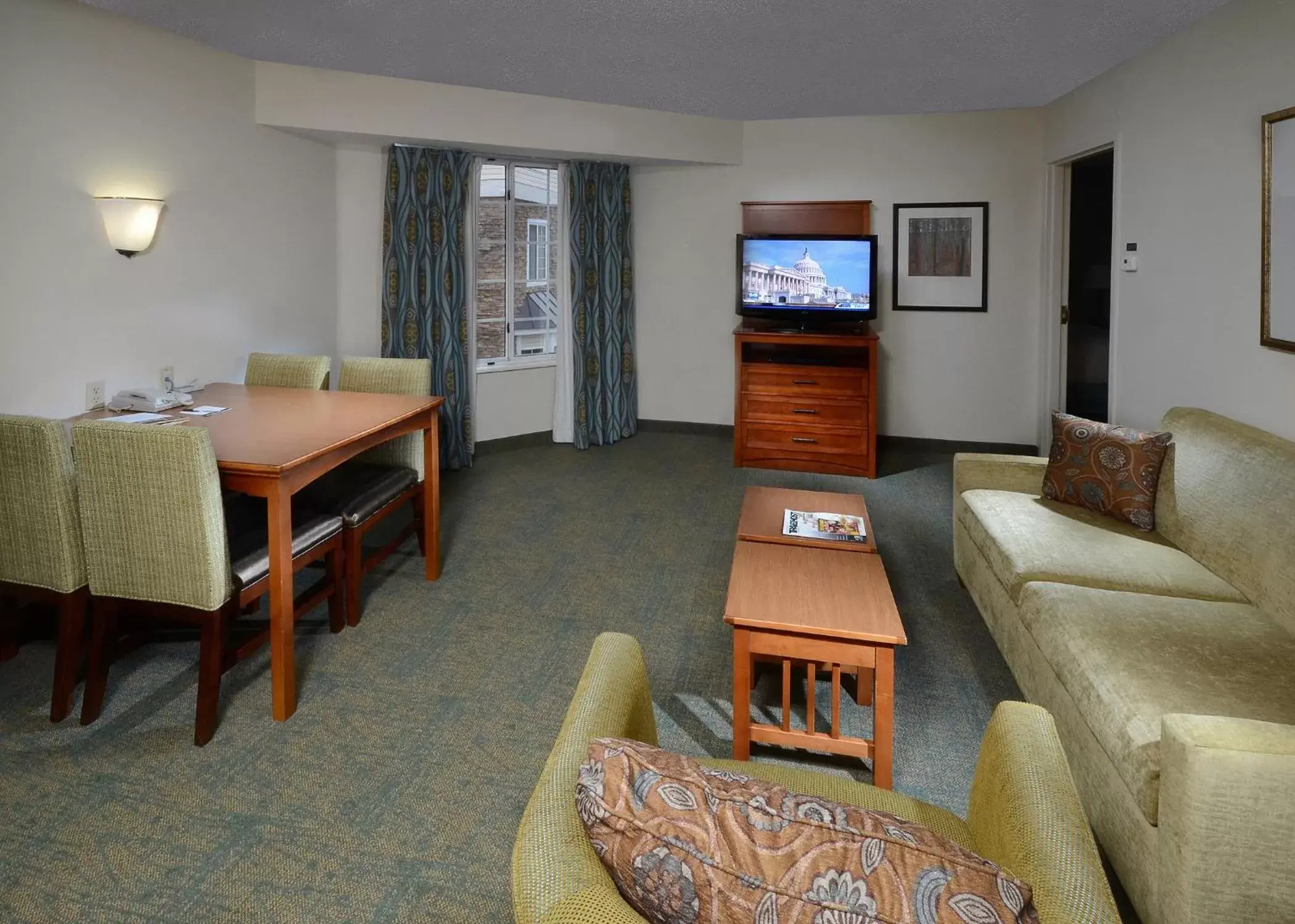 Living room, Seating Area in Staybridge Suites Raleigh-Durham Airport-Morrisville, an IHG Hotel