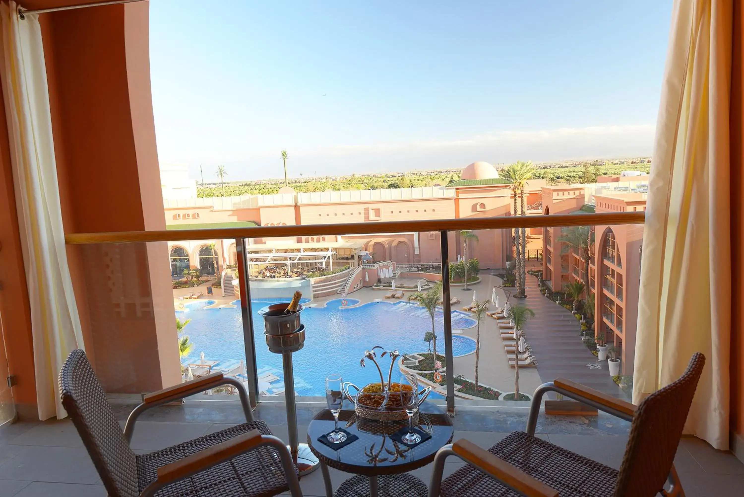 Pool view, Balcony/Terrace in Savoy Le Grand Hotel Marrakech