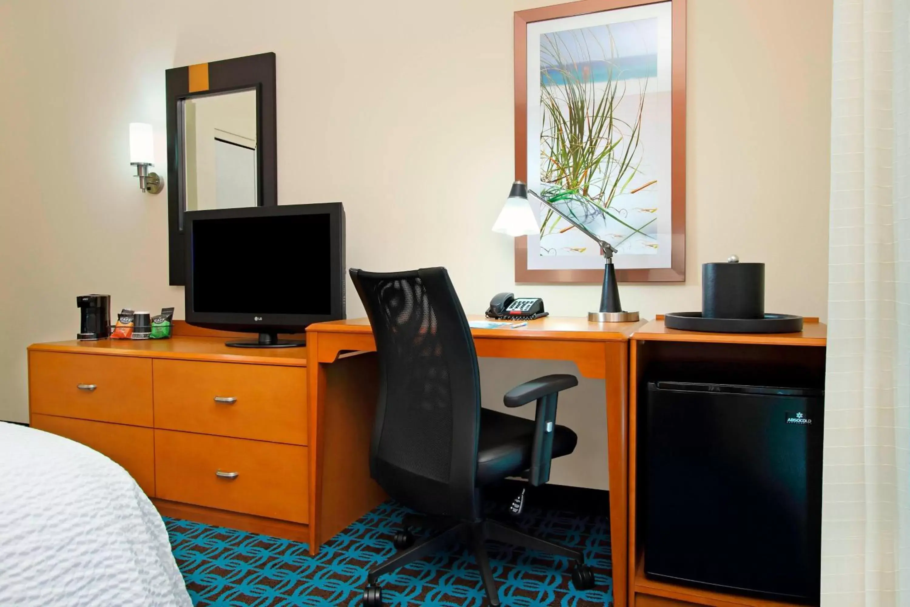 Photo of the whole room, TV/Entertainment Center in Fairfield Inn & Suites Fort Lauderdale Airport & Cruise Port