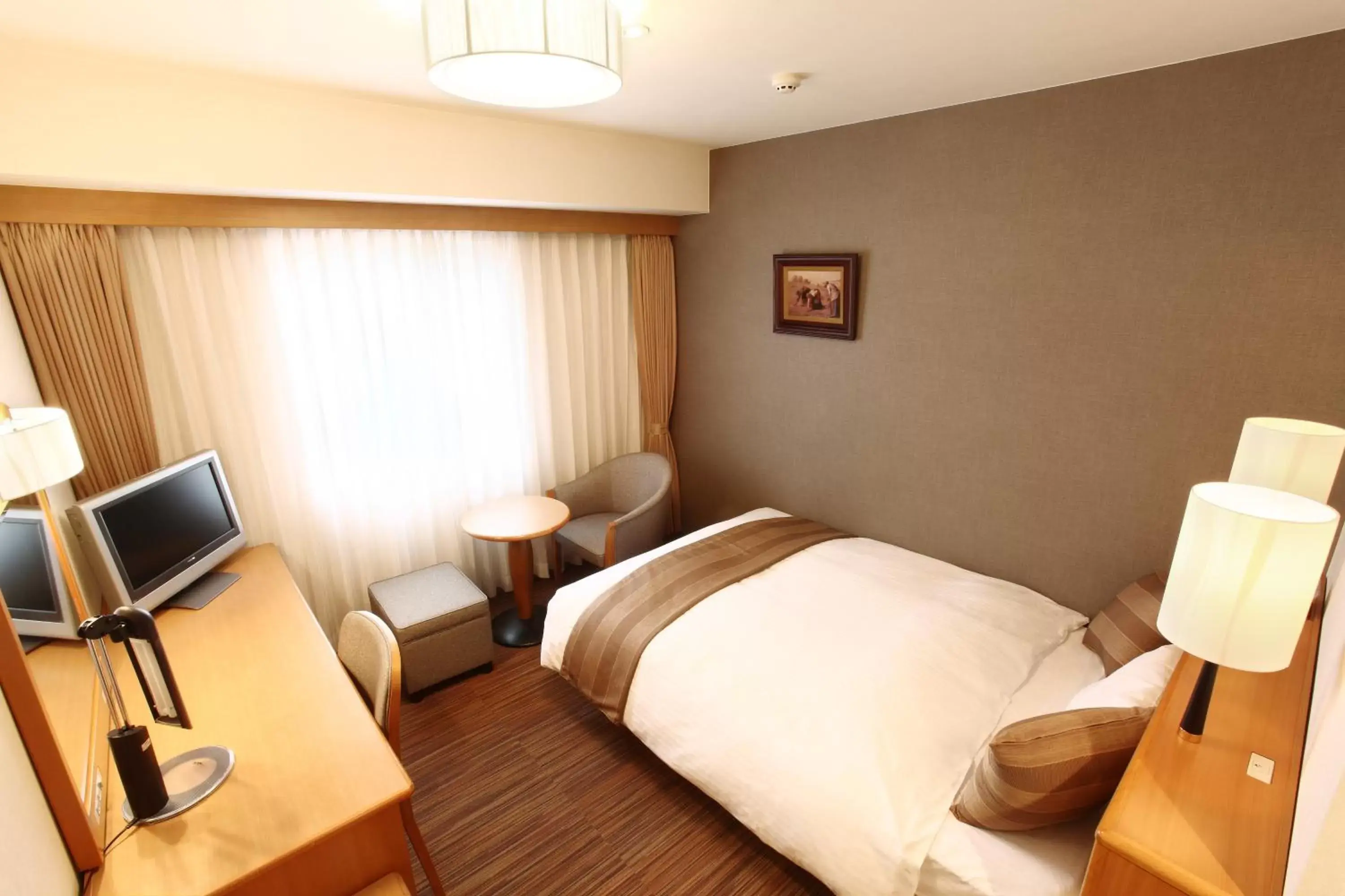 Photo of the whole room, Bed in Okayama Koraku Hotel