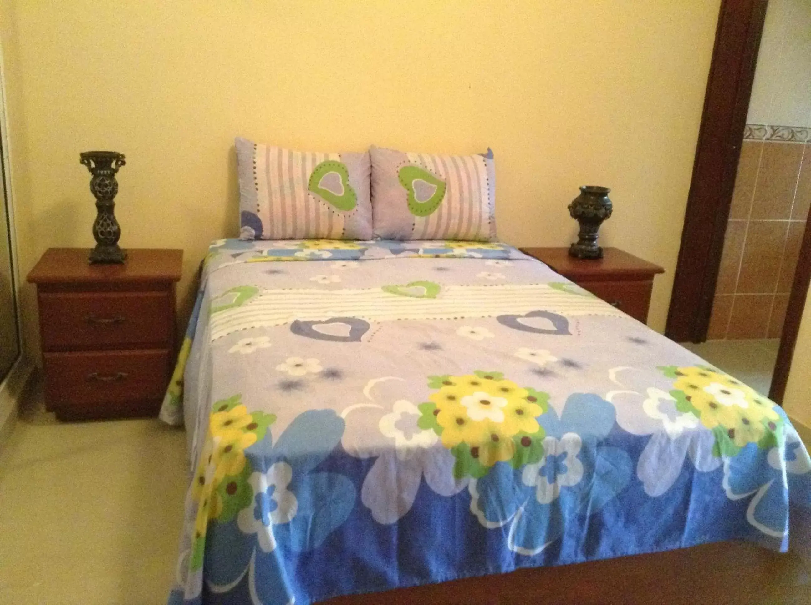 Decorative detail, Bed in White Sands shared apartments