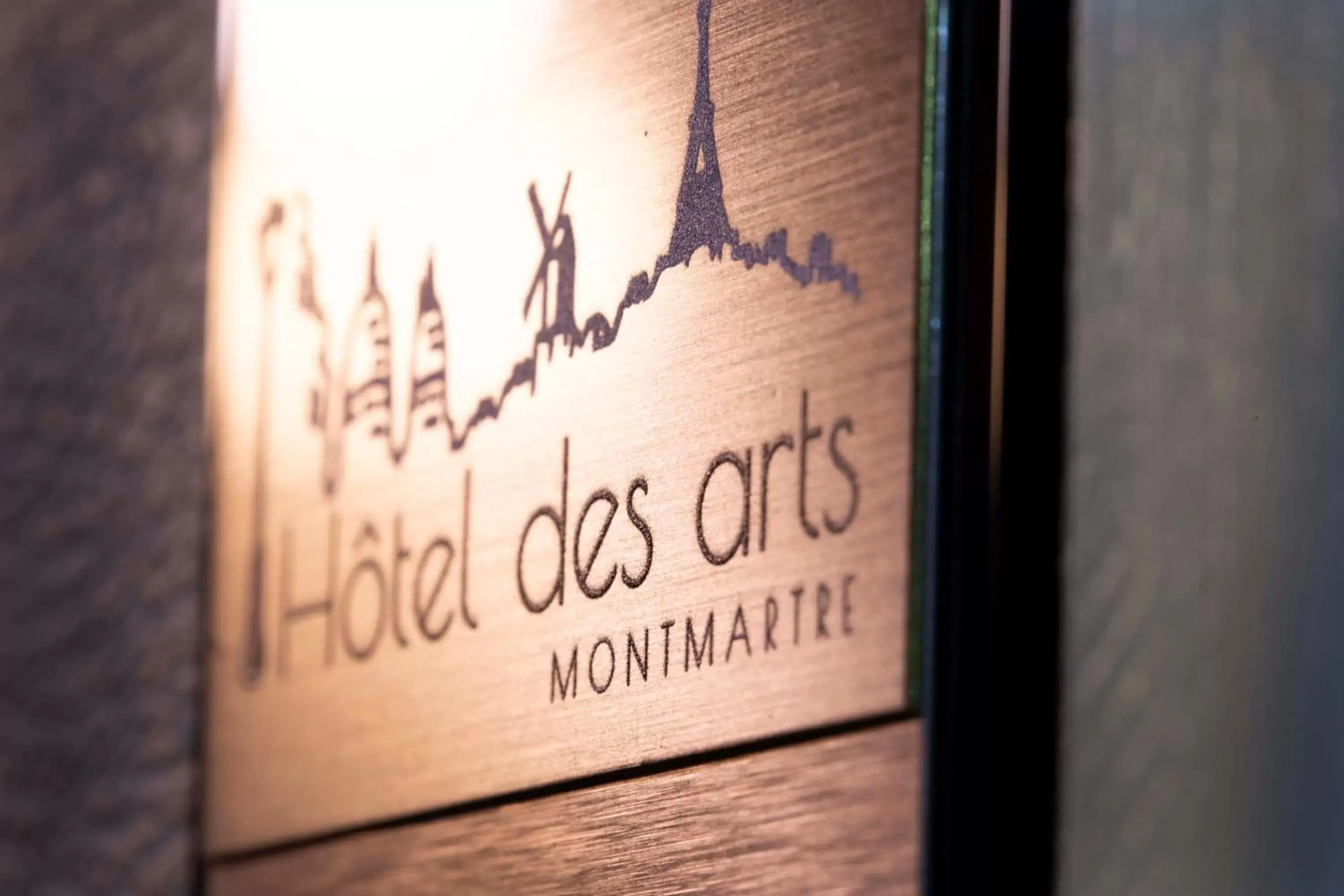 Property logo or sign in Hôtel des Arts Montmartre