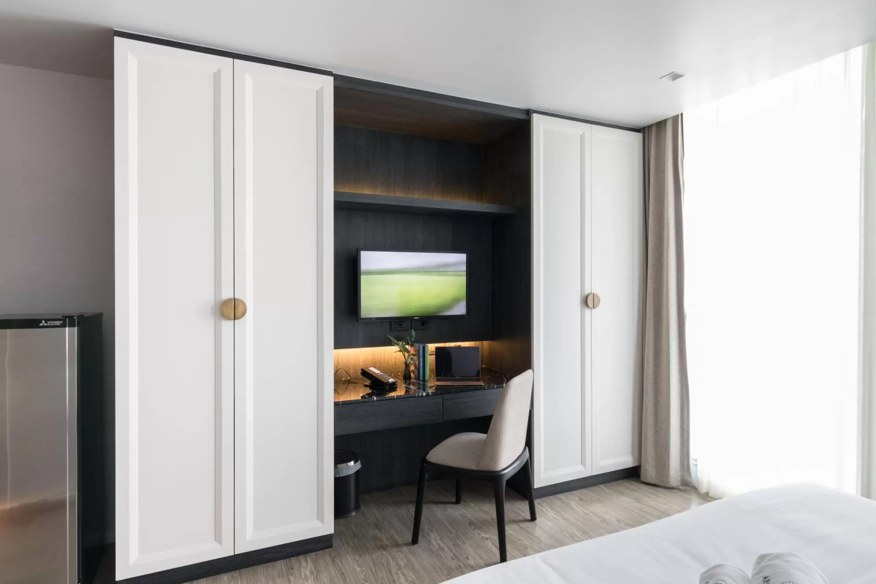 Communal lounge/ TV room, Bed in Apartelle Jatujak Hotel Communal lounge/ TV room, Bed in Apartelle Jatujak Hotel