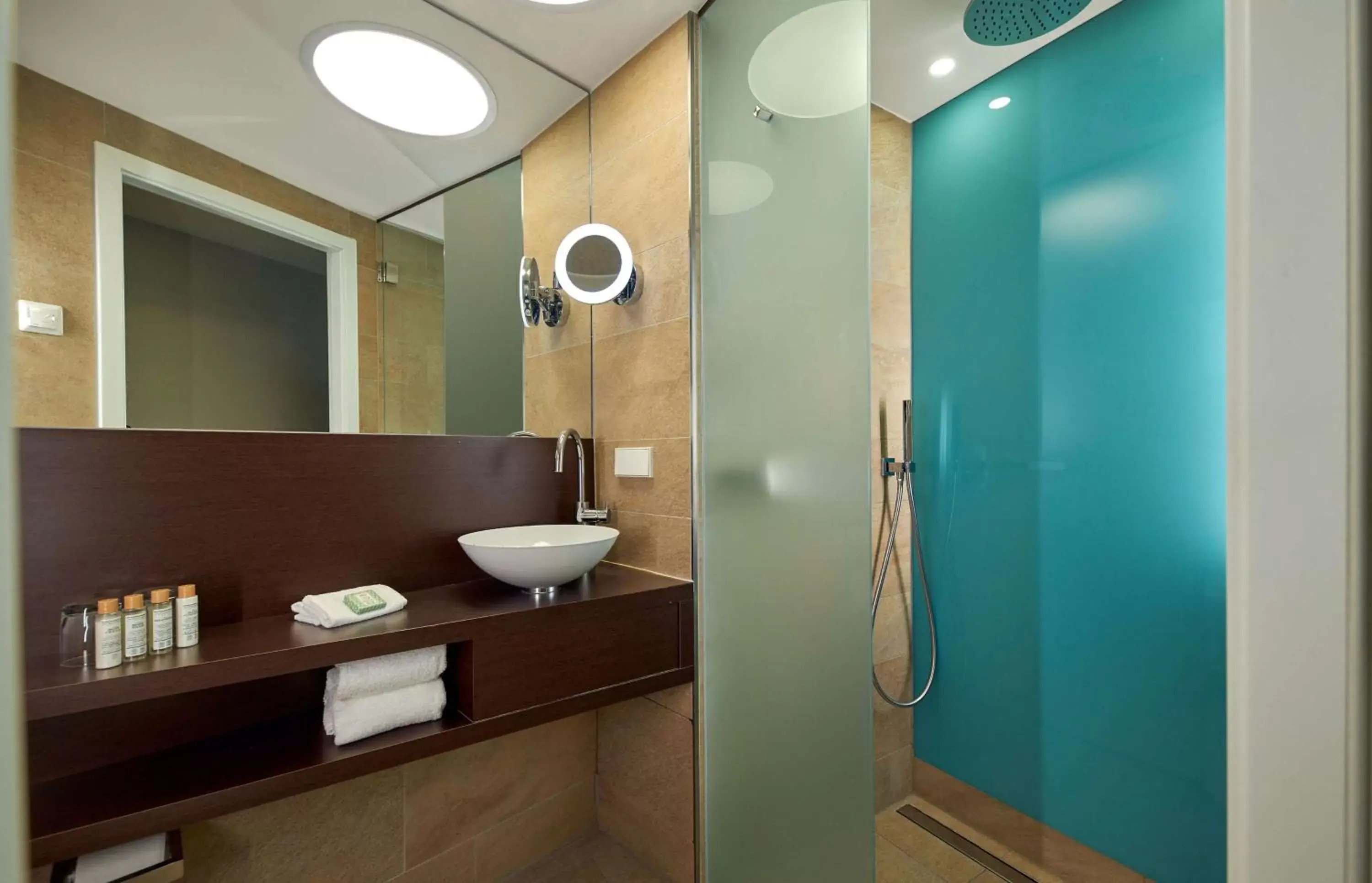 Bathroom in Wasserturm Hotel Cologne, Curio Collection by Hilton