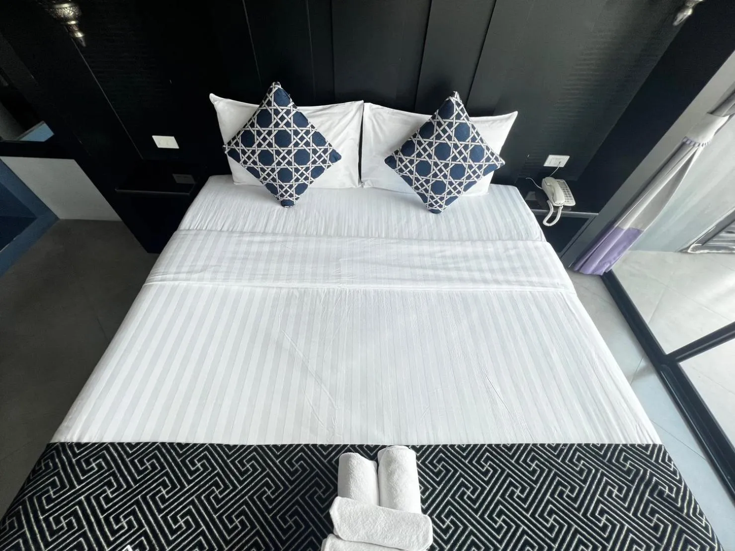 Bed in Srisawara Casa Hotel