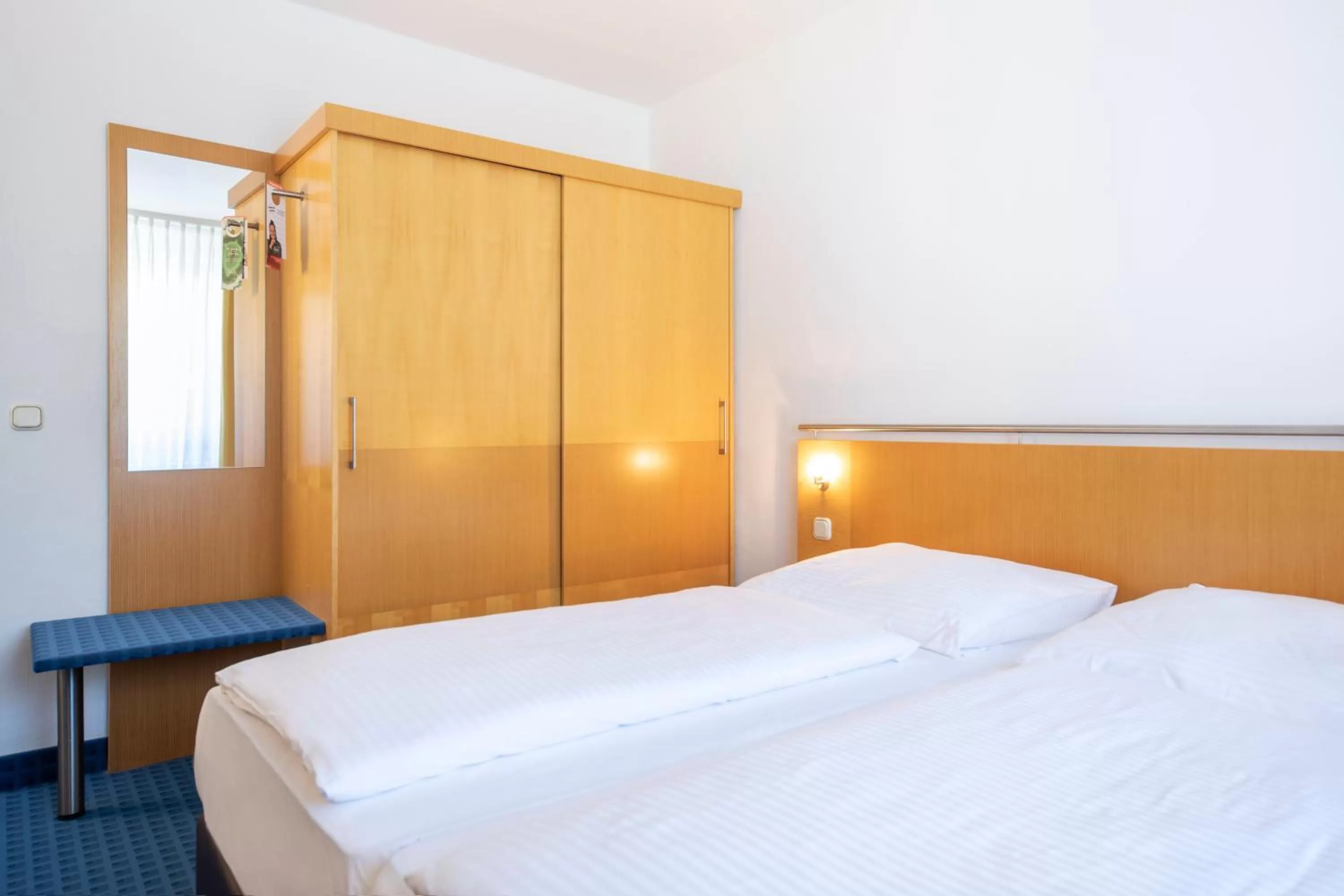 Photo of the whole room, Bed in ACHAT Hotel Suhl