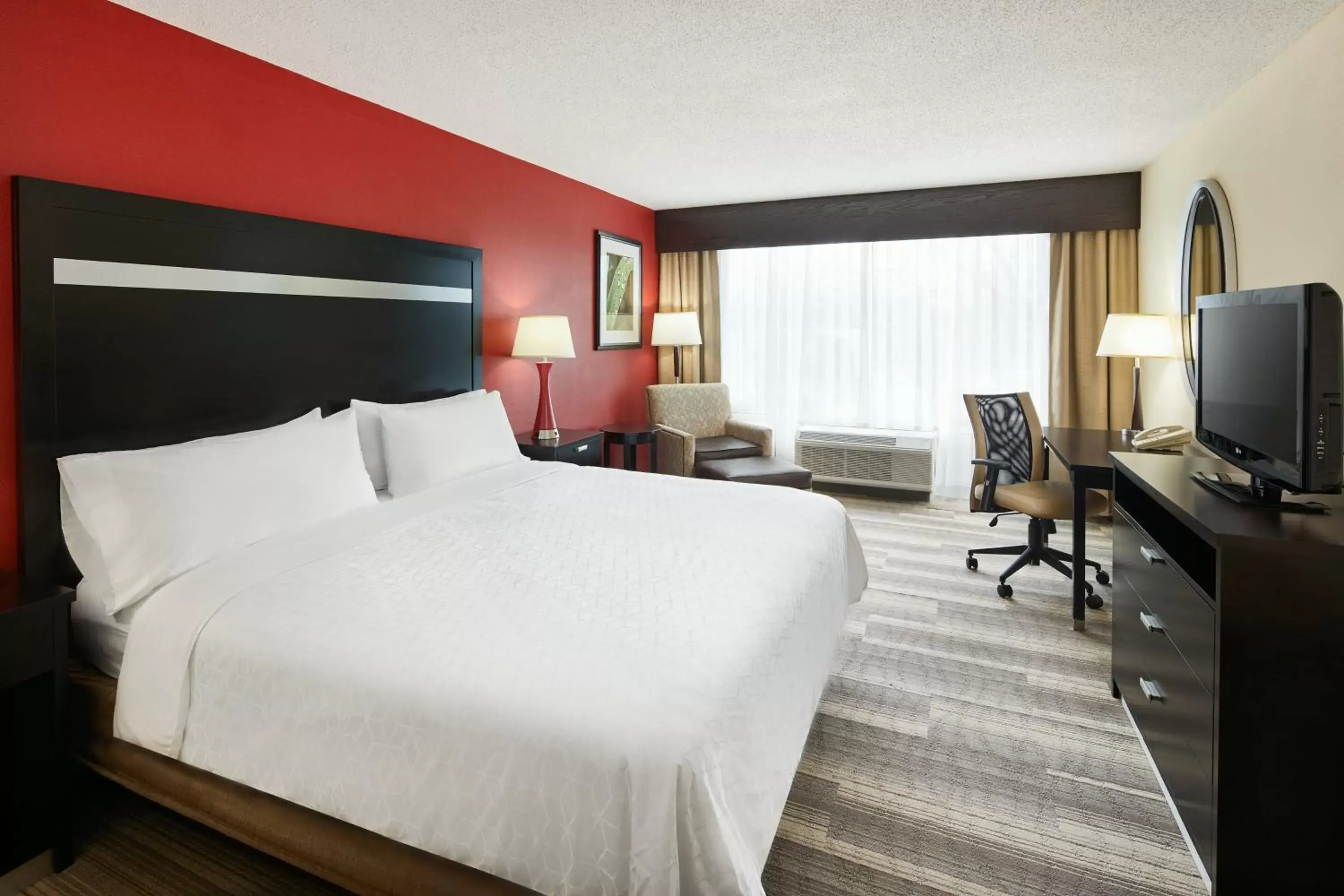 Photo of the whole room, Bed in Holiday Inn Express & Suites I-26 & Us 29 At Westgate Mall, an IHG Hotel