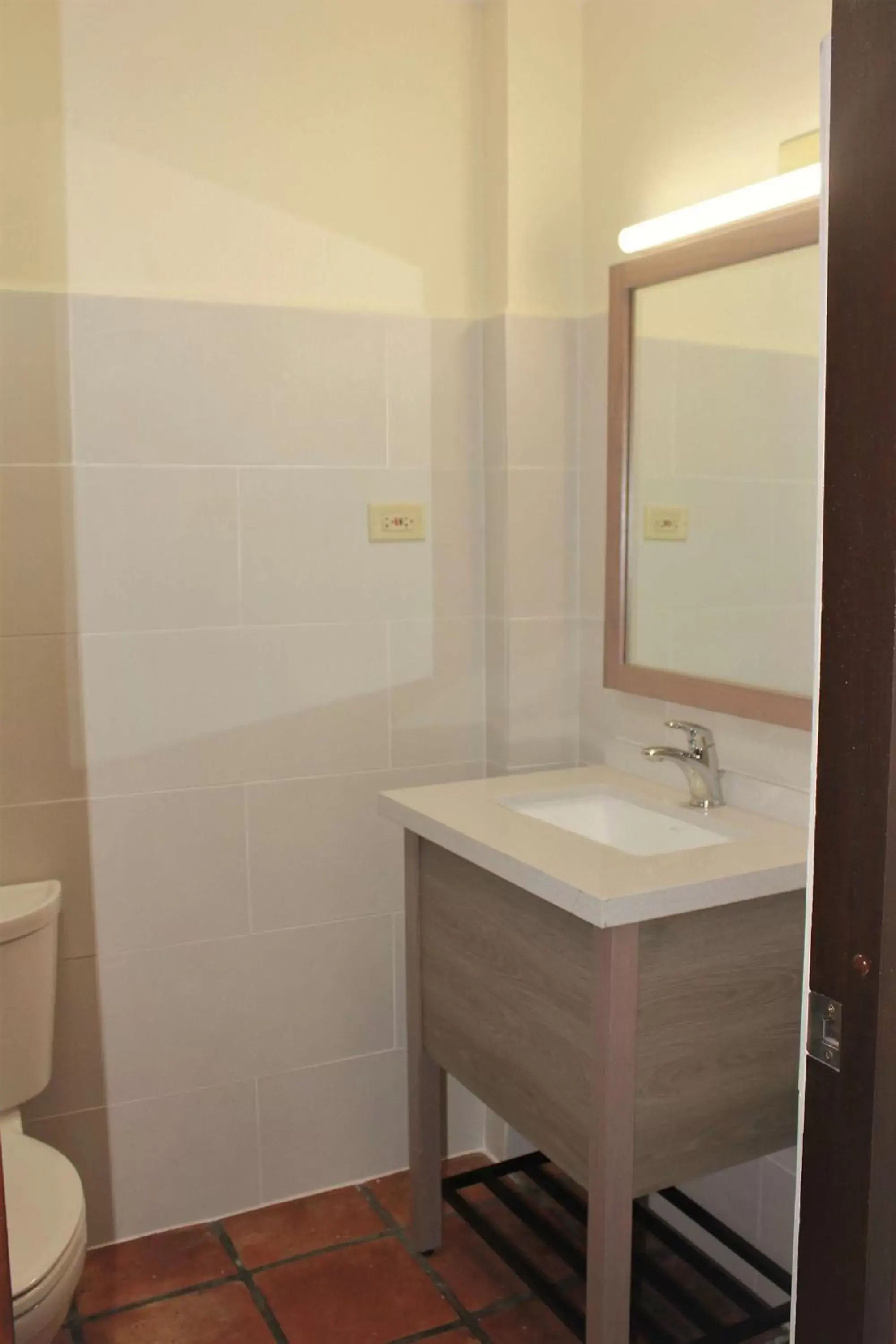 Bathroom in Mayaguez Plaza Hotel; SureStay Collection by Best Western