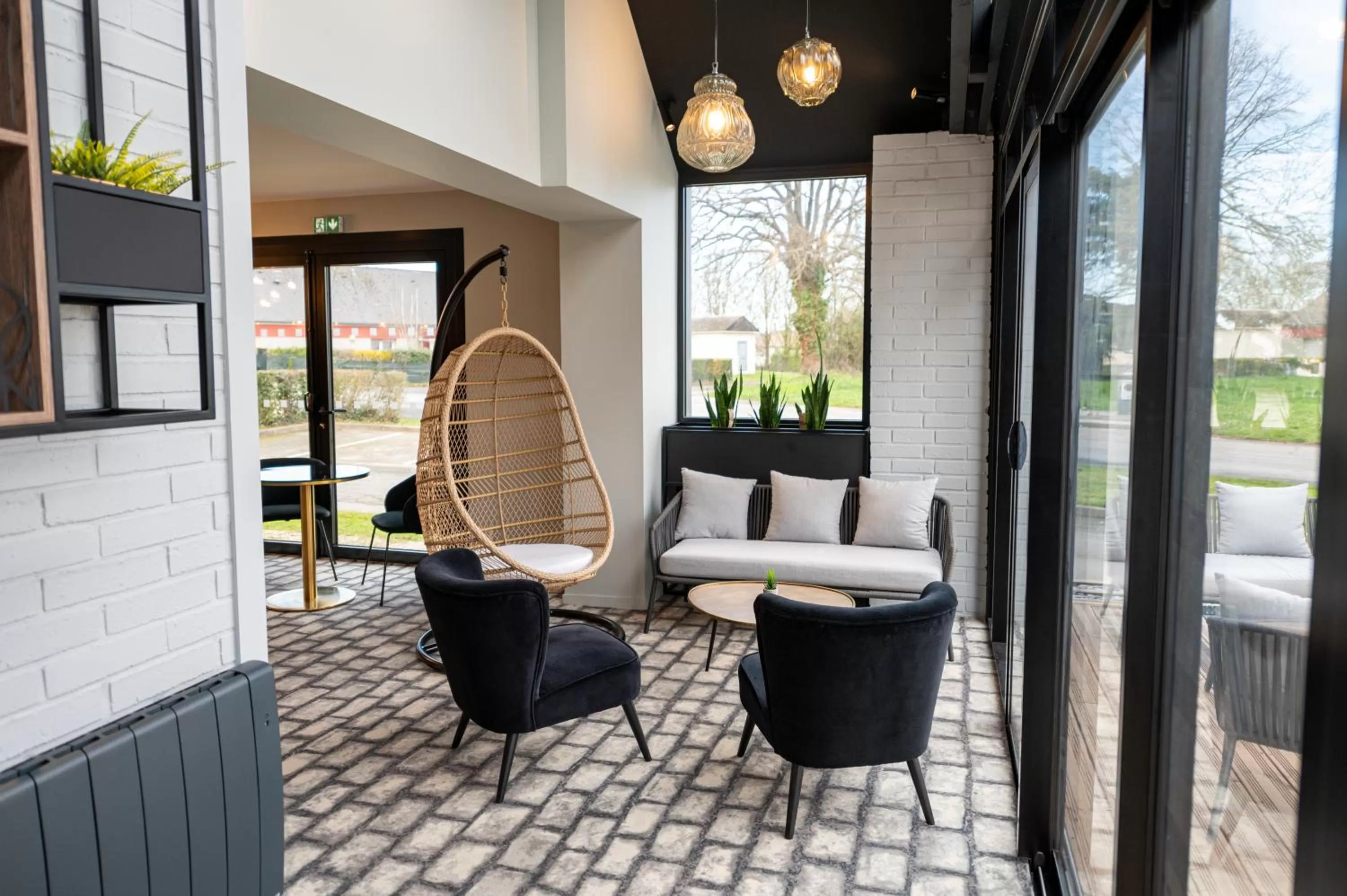 Seating area in Kyriad Hotel Laval