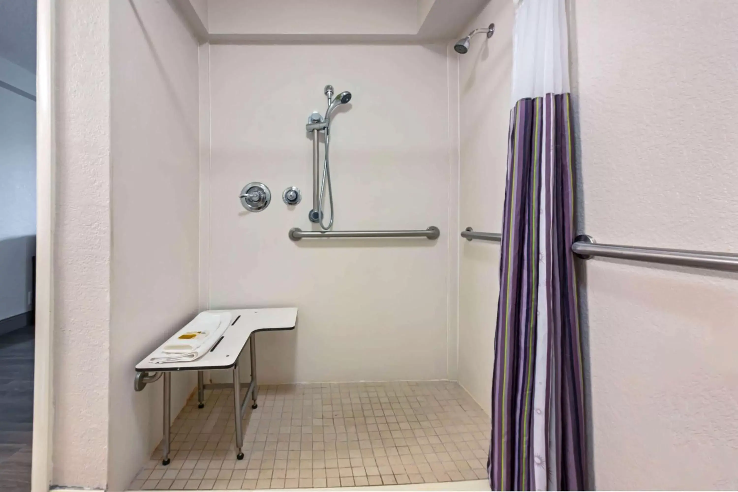 Shower, Bathroom in La Quinta Inn by Wyndham West Palm Beach - Florida Turnpike
