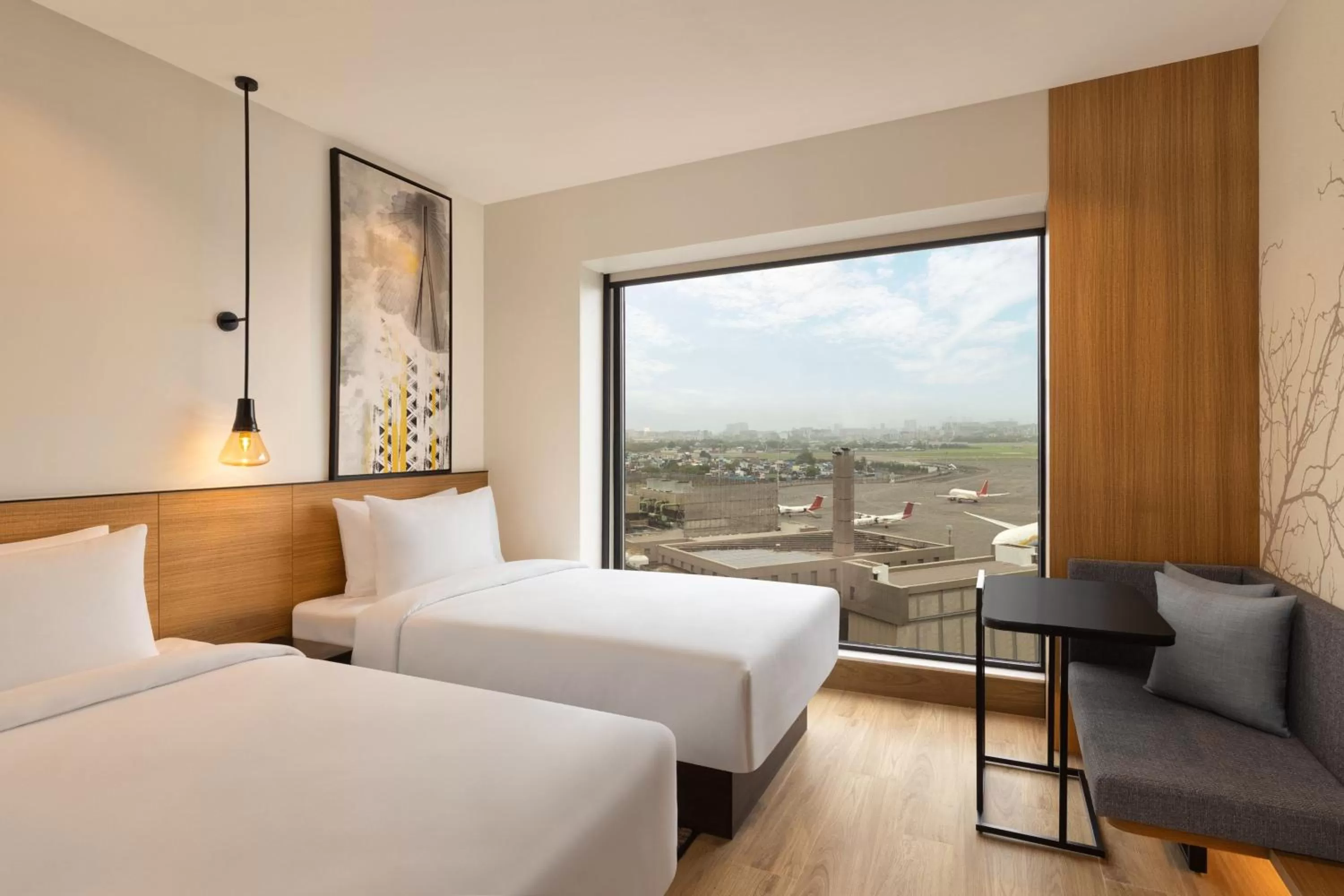 Photo of the whole room, Bed in Fairfield by Marriott Mumbai International Airport