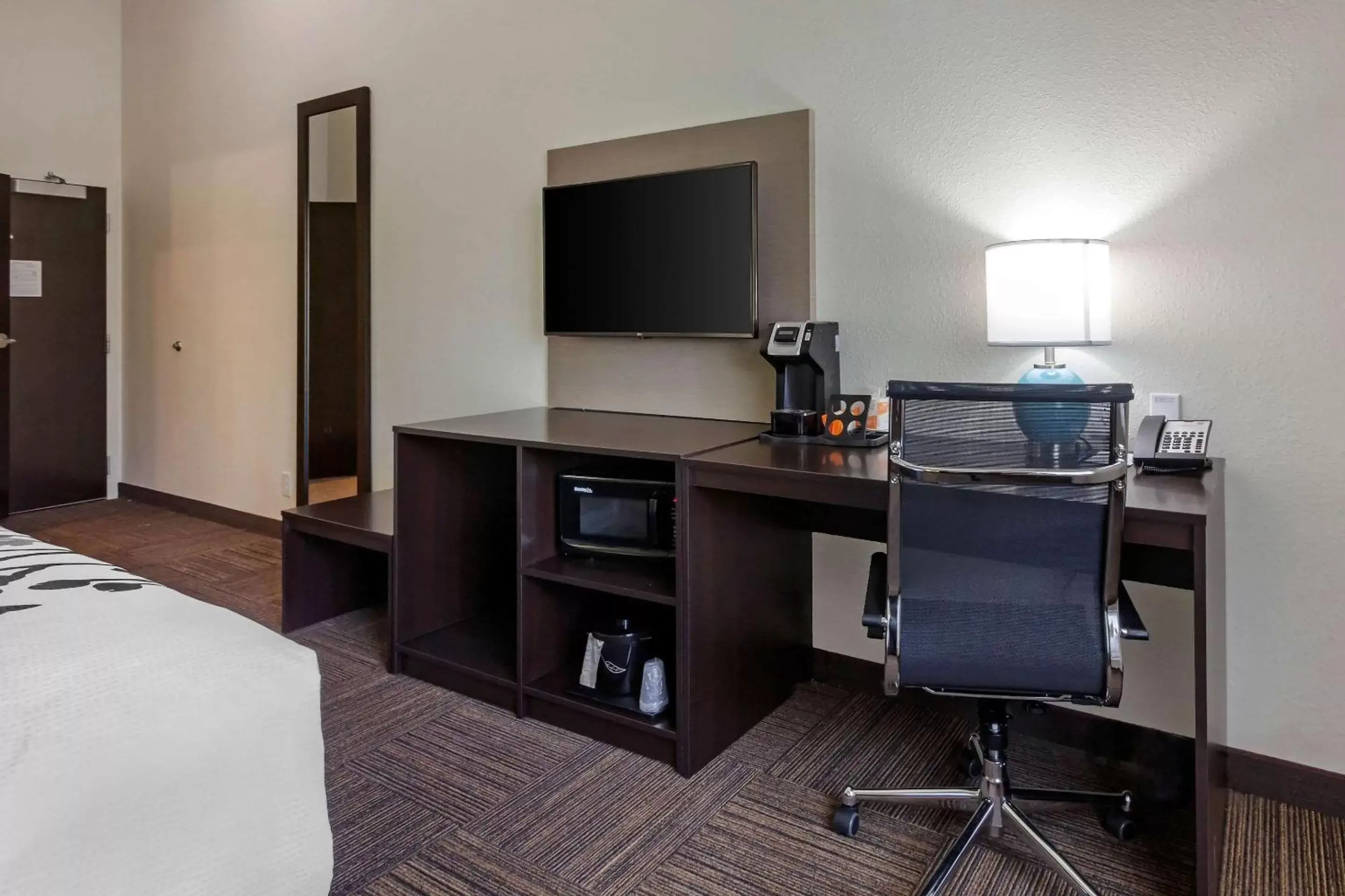 Photo of the whole room, TV/Entertainment Center in Sleep Inn & Suites Tampa South