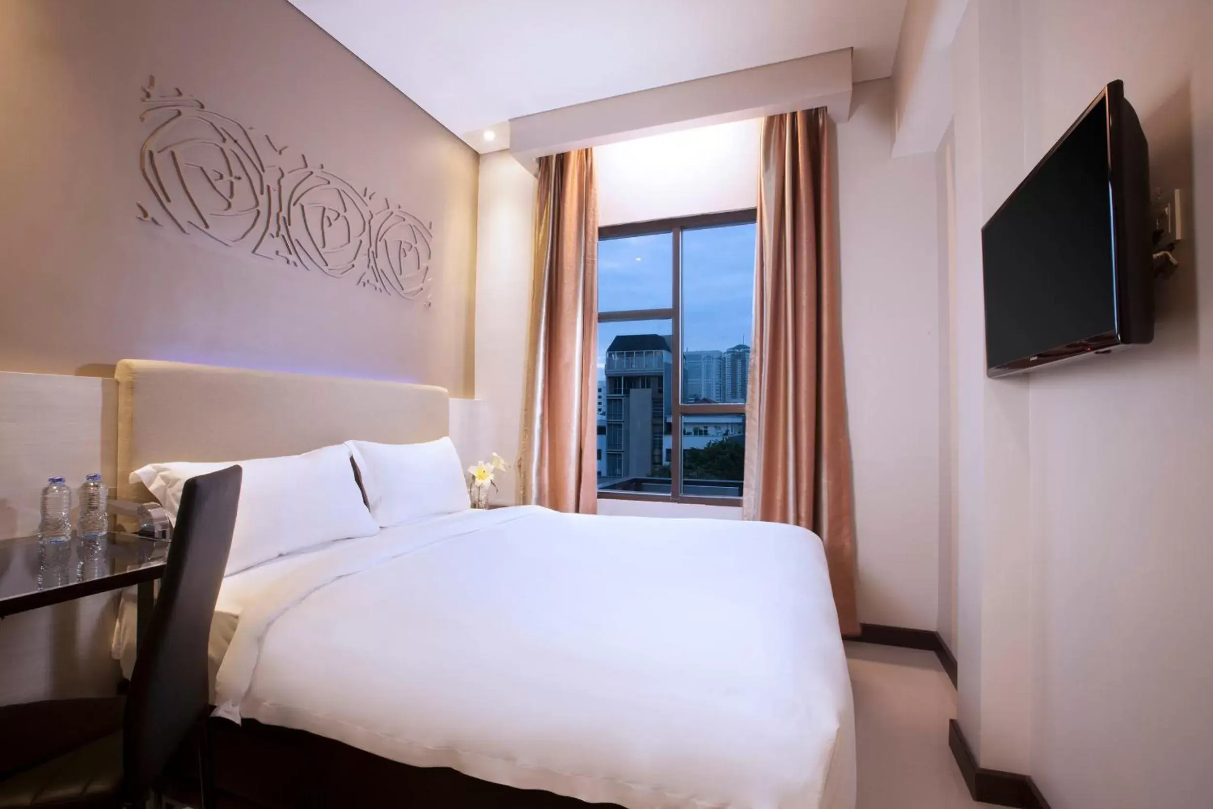Bedroom in Verse Lite Hotel Gajah Mada