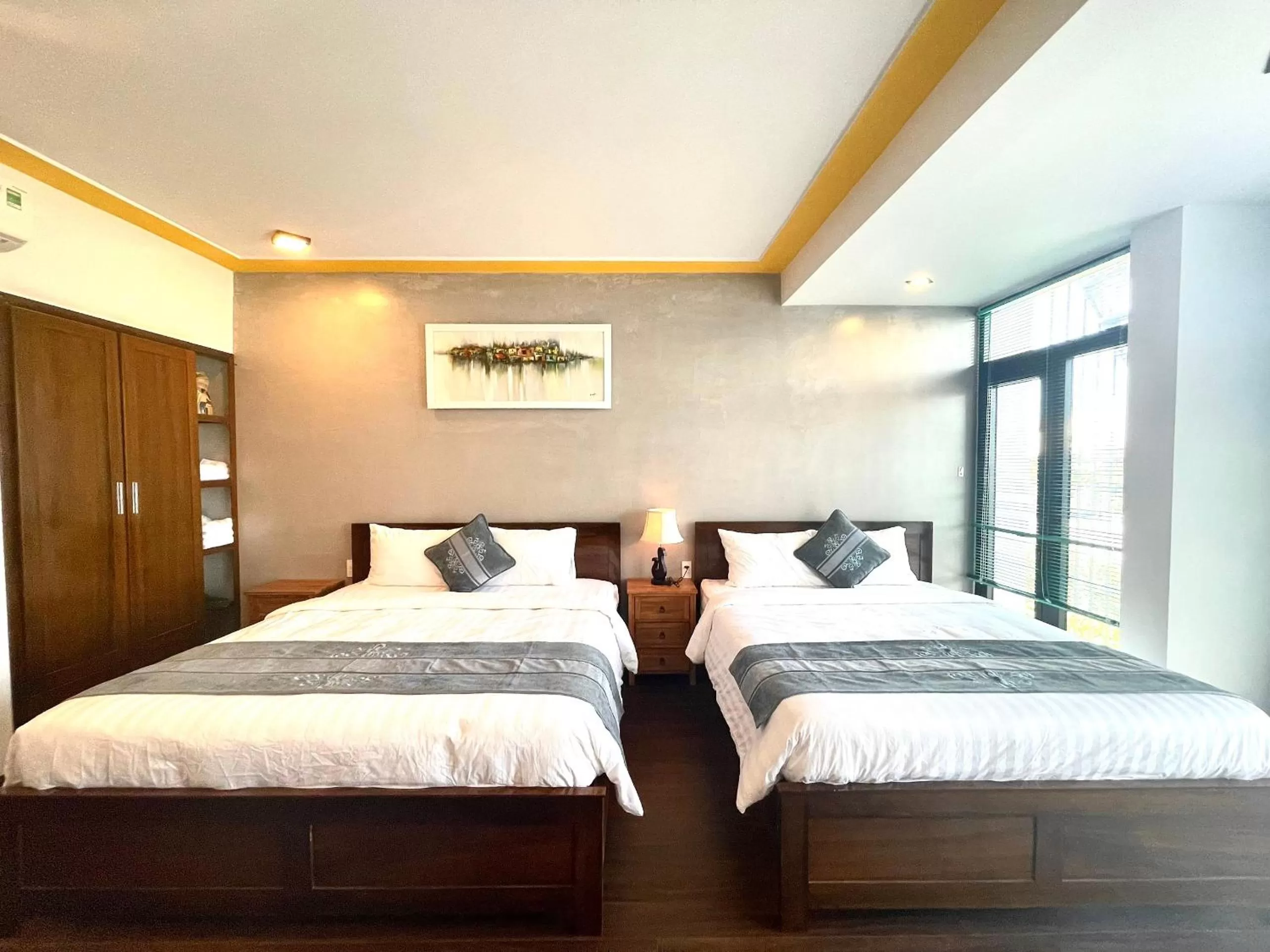 Photo of the whole room, Bed in Hoi An Riverlight