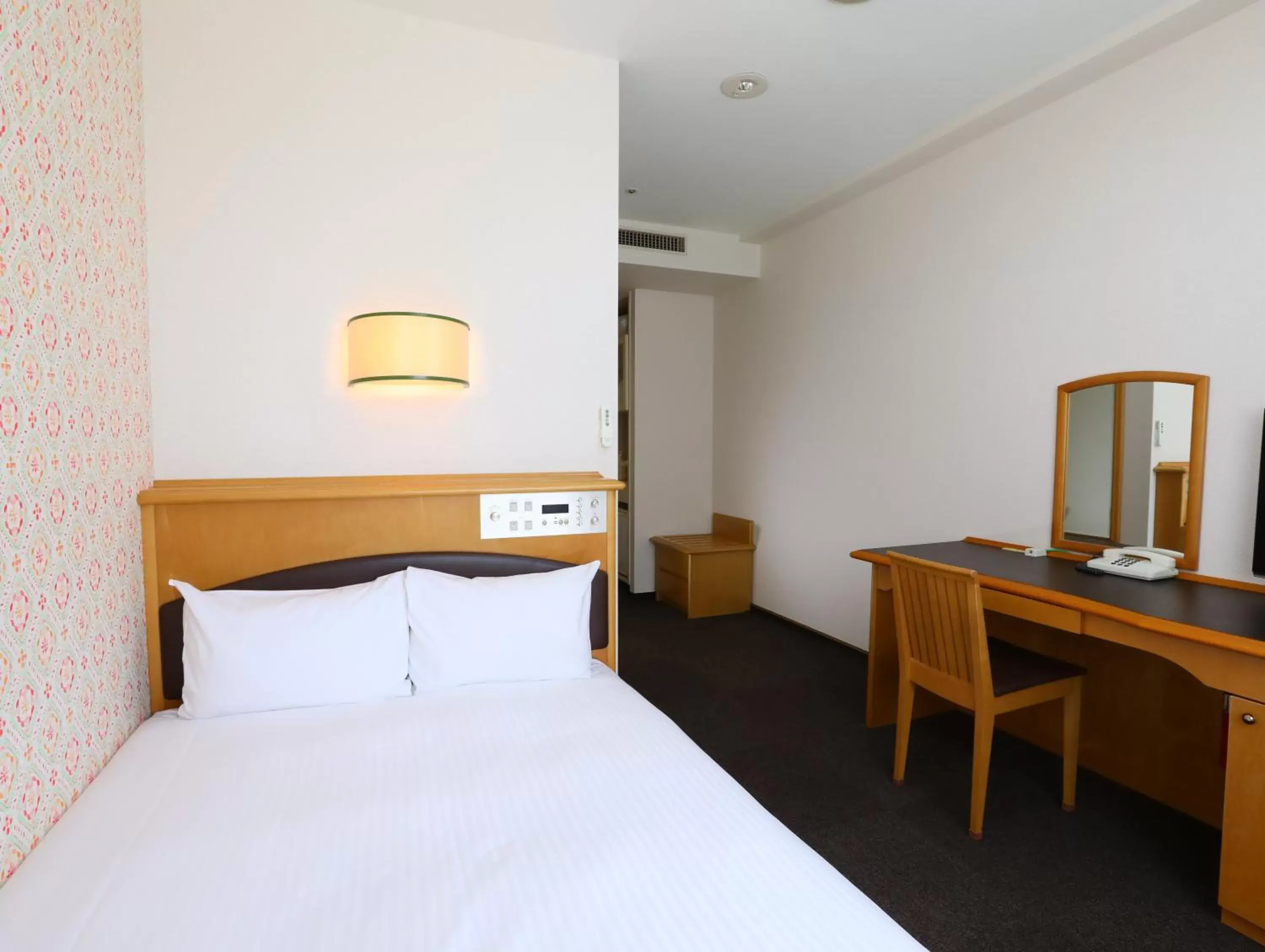 Bed in Hotel Wing International Tomakomai