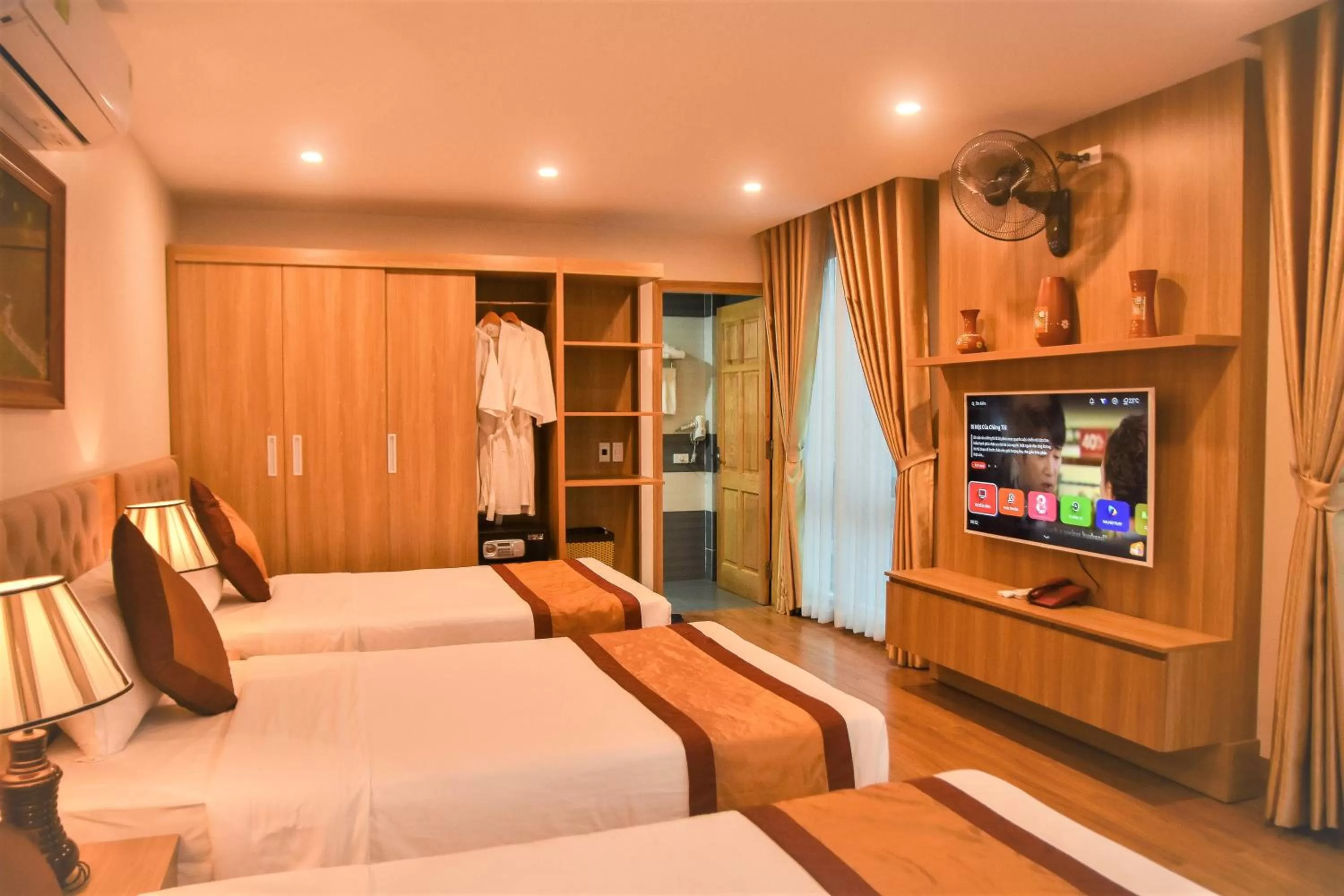 TV and multimedia, Bed in Cozynibi Hotel