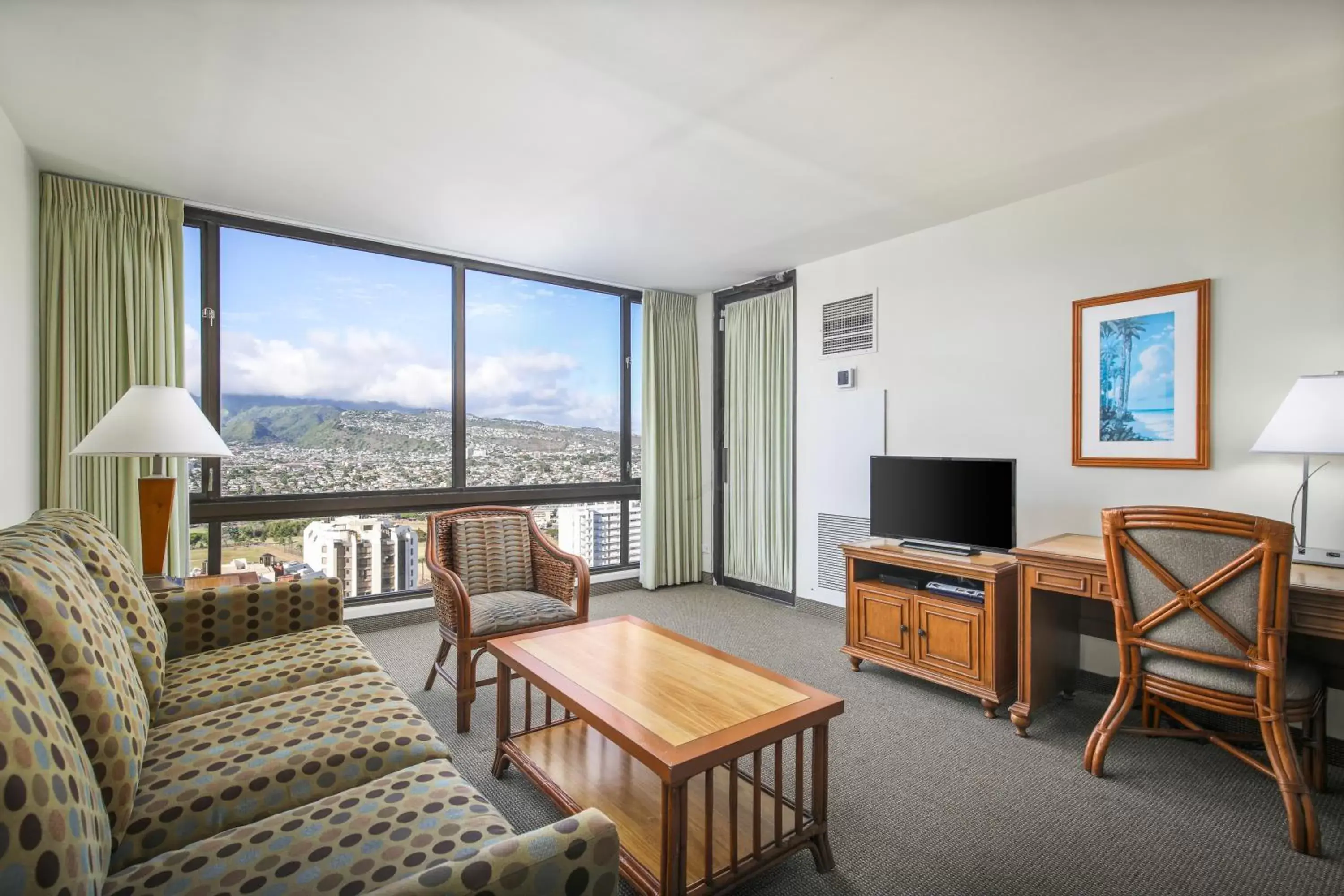 Communal lounge/ TV room, Seating Area in Aston Waikiki Sunset