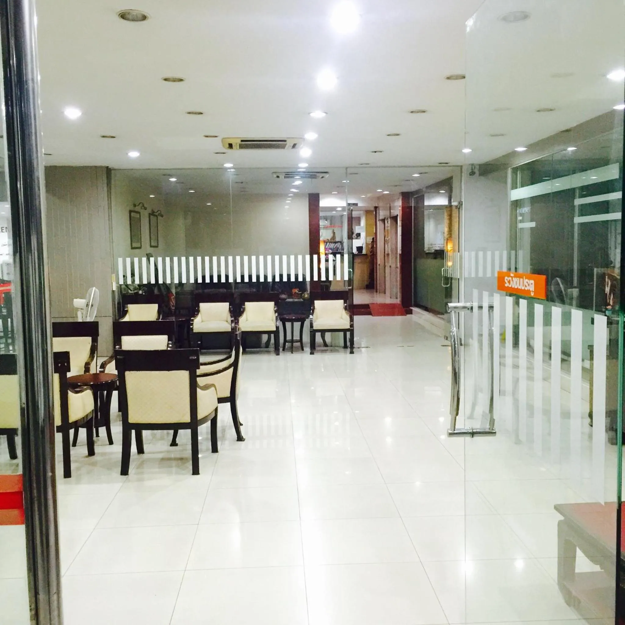 Lobby or reception in Mall Suites Hotel
