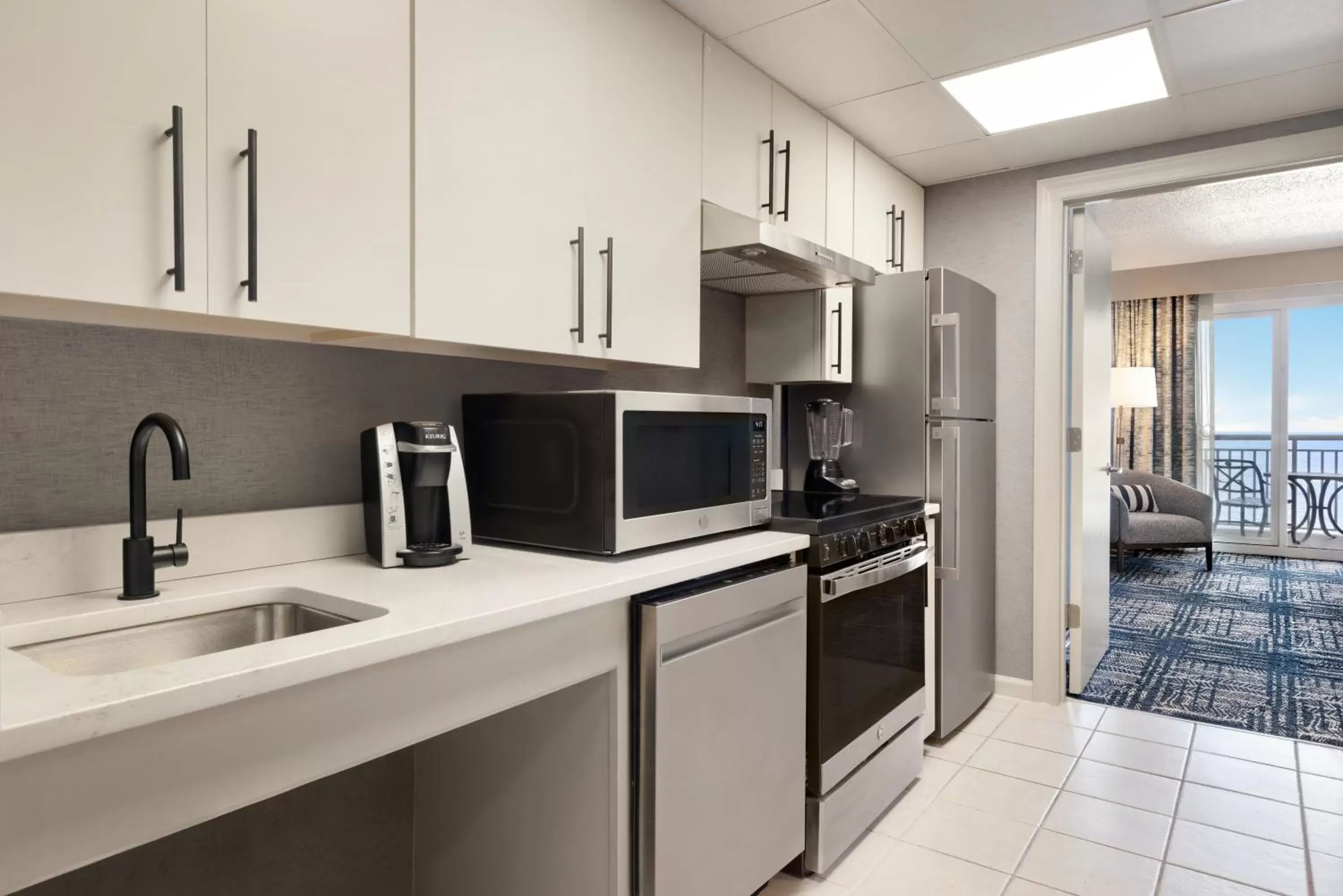 Kitchen or kitchenette, Kitchen/Kitchenette in Holiday Inn & Suites Ocean City, an IHG Hotel