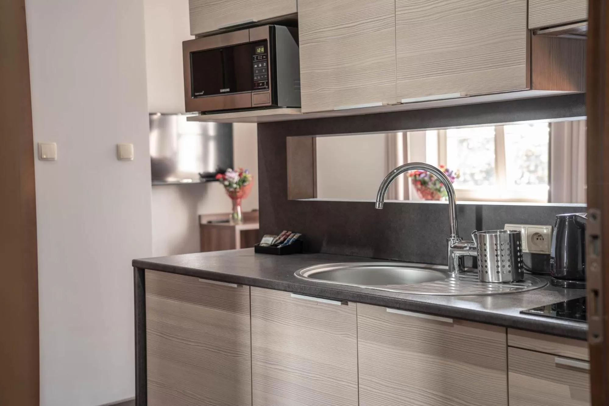 Kitchen or kitchenette in Apart Neptun