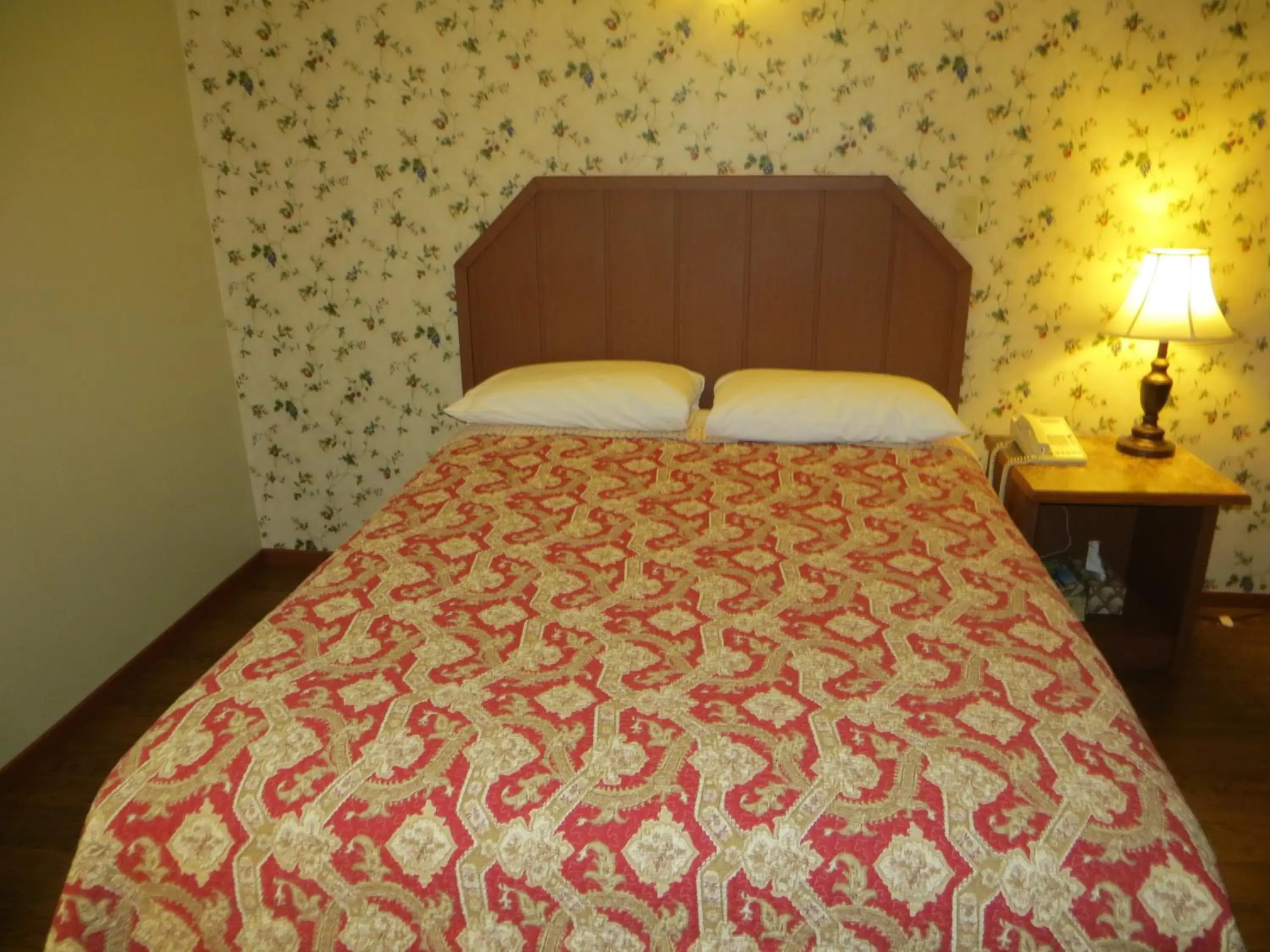 Bed in Queen Bee Hotel