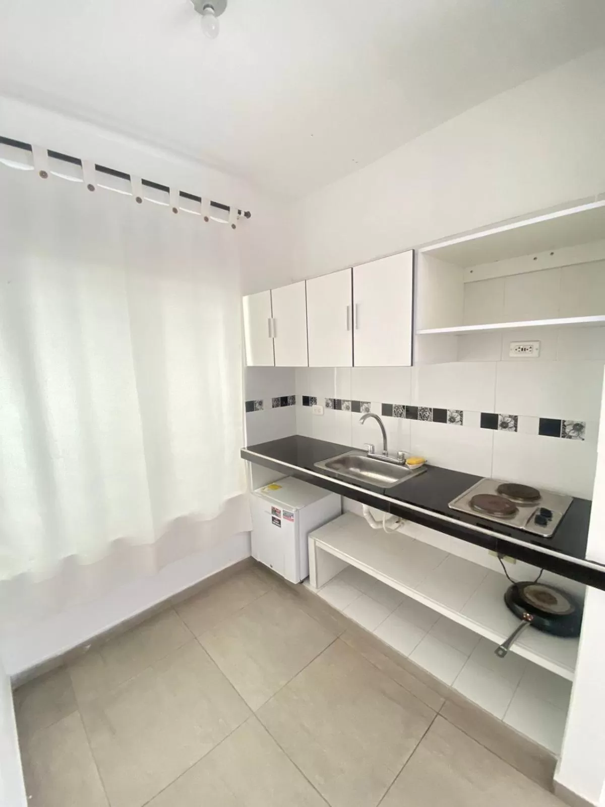 Kitchen or kitchenette in HOTEL EBENEZER