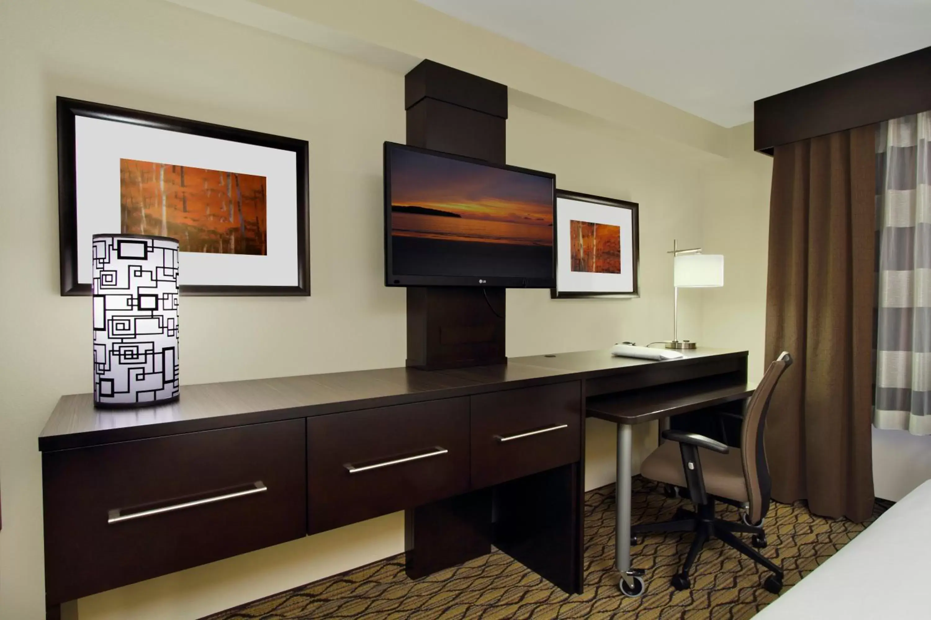 Photo of the whole room, TV/Entertainment Center in Holiday Inn Express - Colorado Springs - First & Main, an IHG Hotel