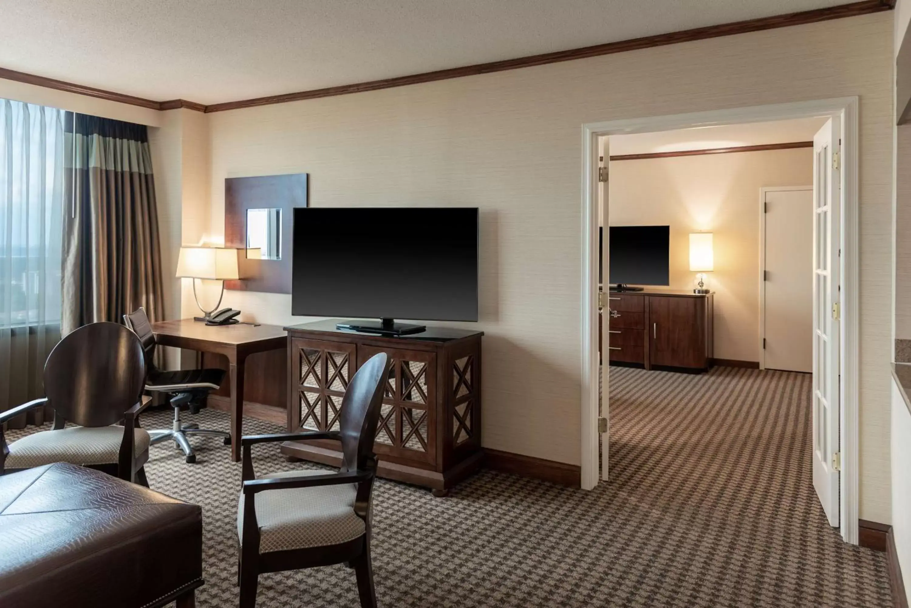 Bedroom, TV/Entertainment Center in Hilton Alexandria Mark Center