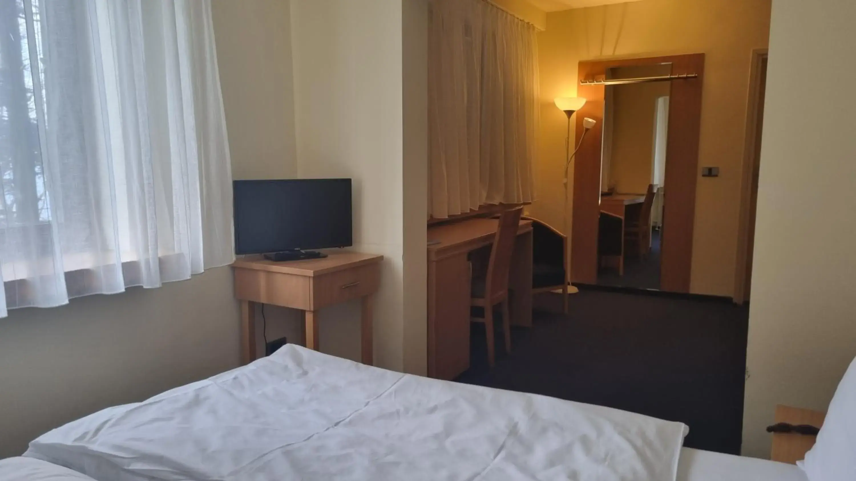 Bed, TV/Entertainment Center in Hotel Tomislavov Dom