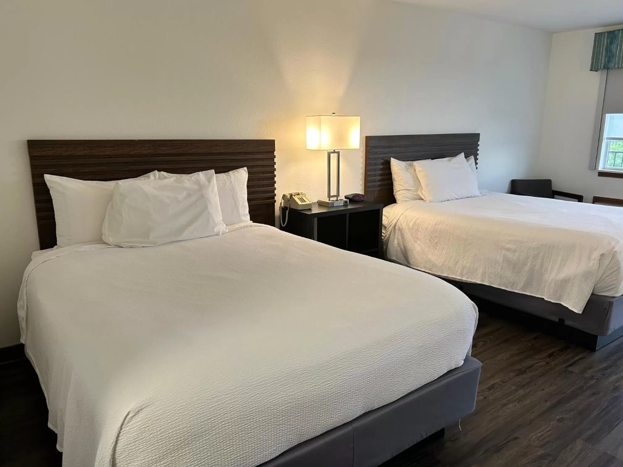 Bed in Seven Gables Inn