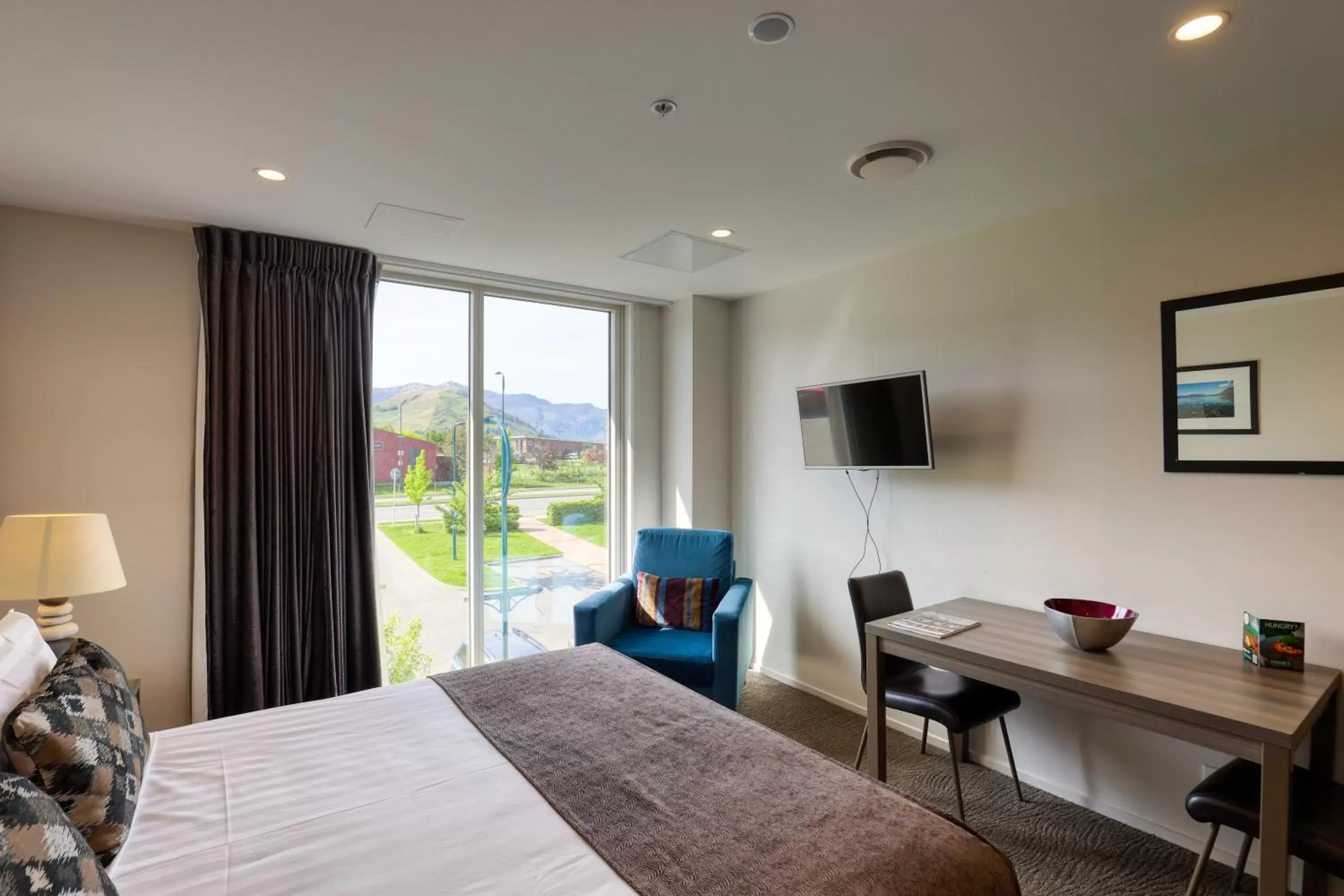 Bed in Ramada Suites by Wyndham Queenstown Remarkables Park