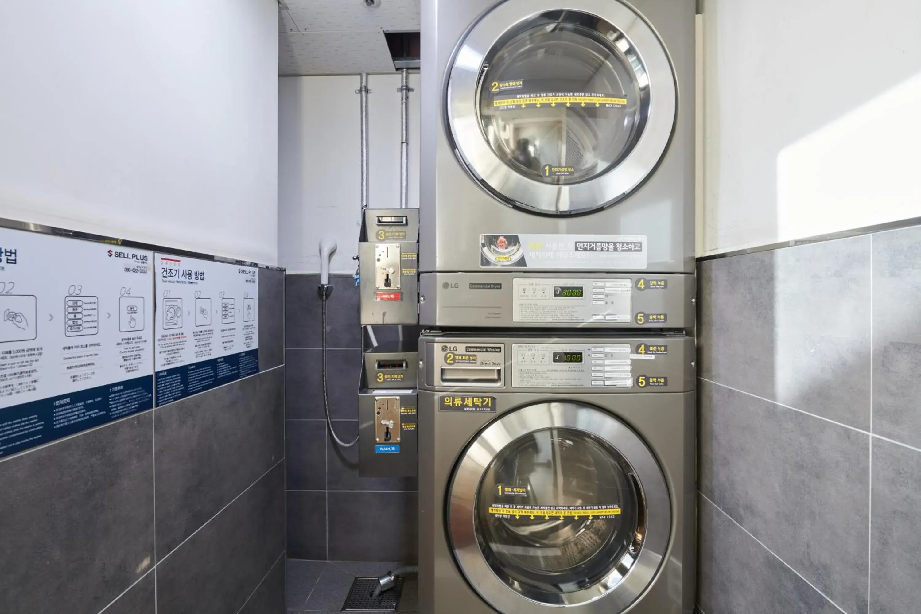 washing machine, Bathroom in Nine Tree Hotel Myeongdong