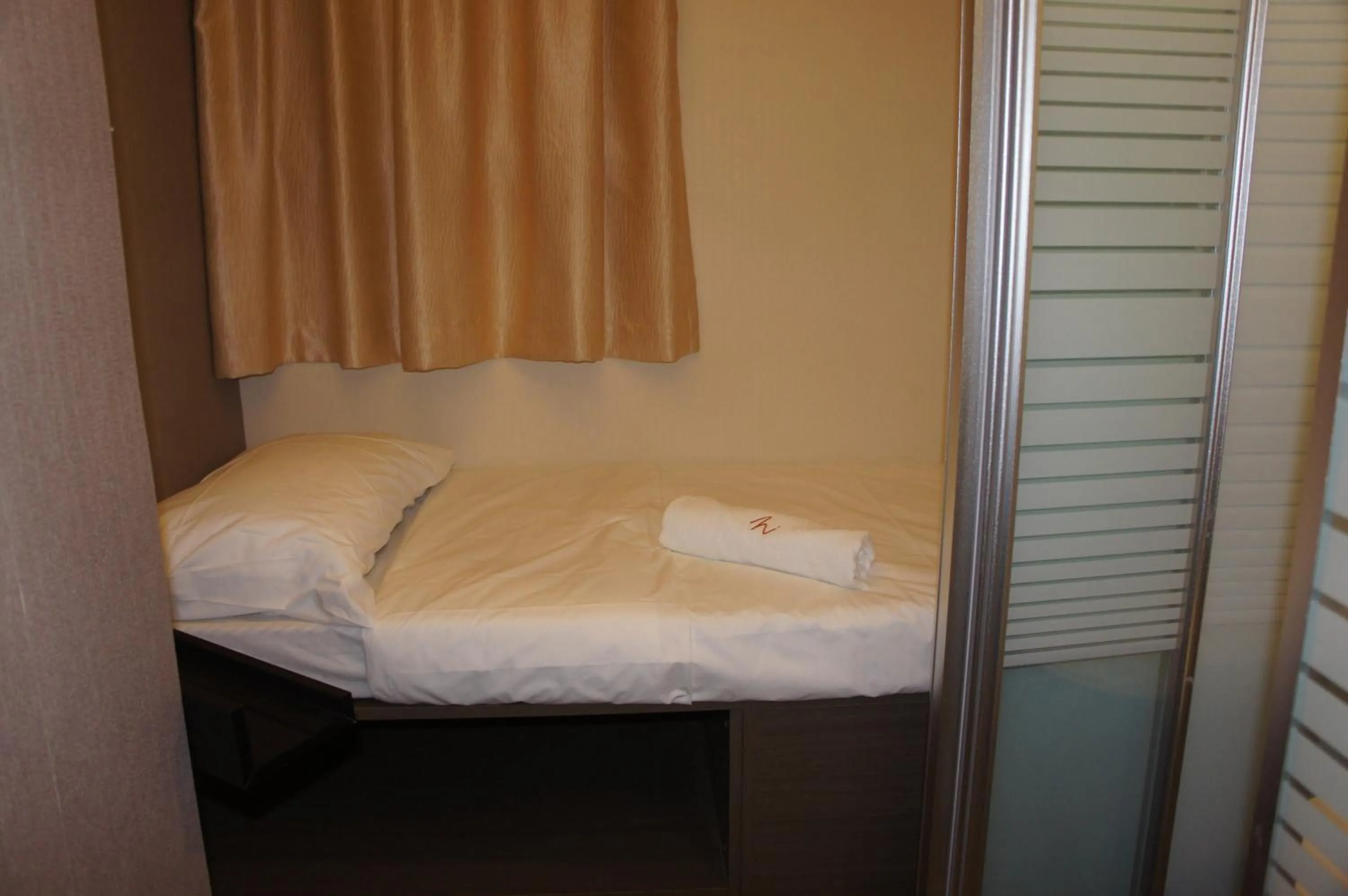 Bed in Homy Inn North Point