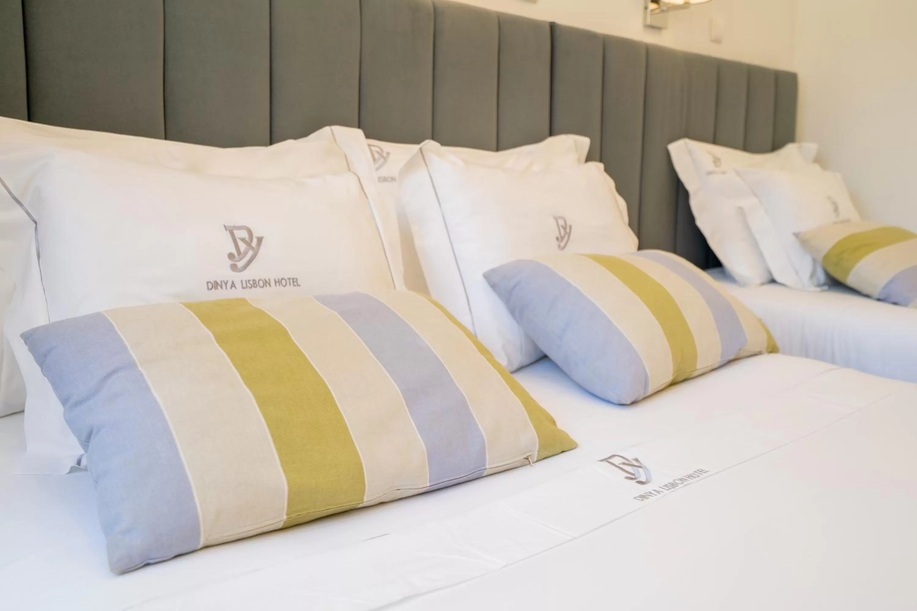 Bed in Dinya Lisbon Hotel