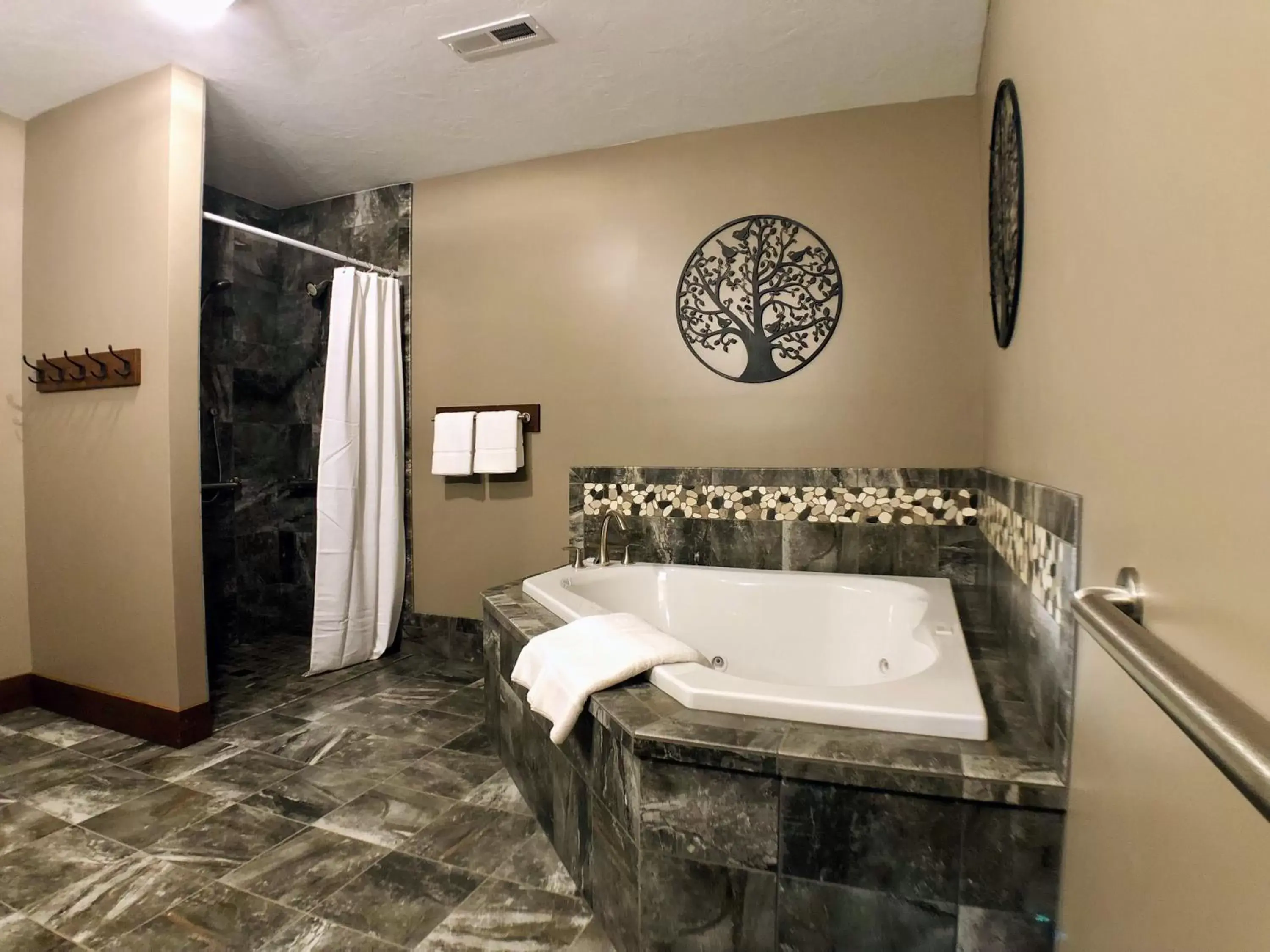 Bathroom in Sojourner's Lodge & Log Cabin Suites