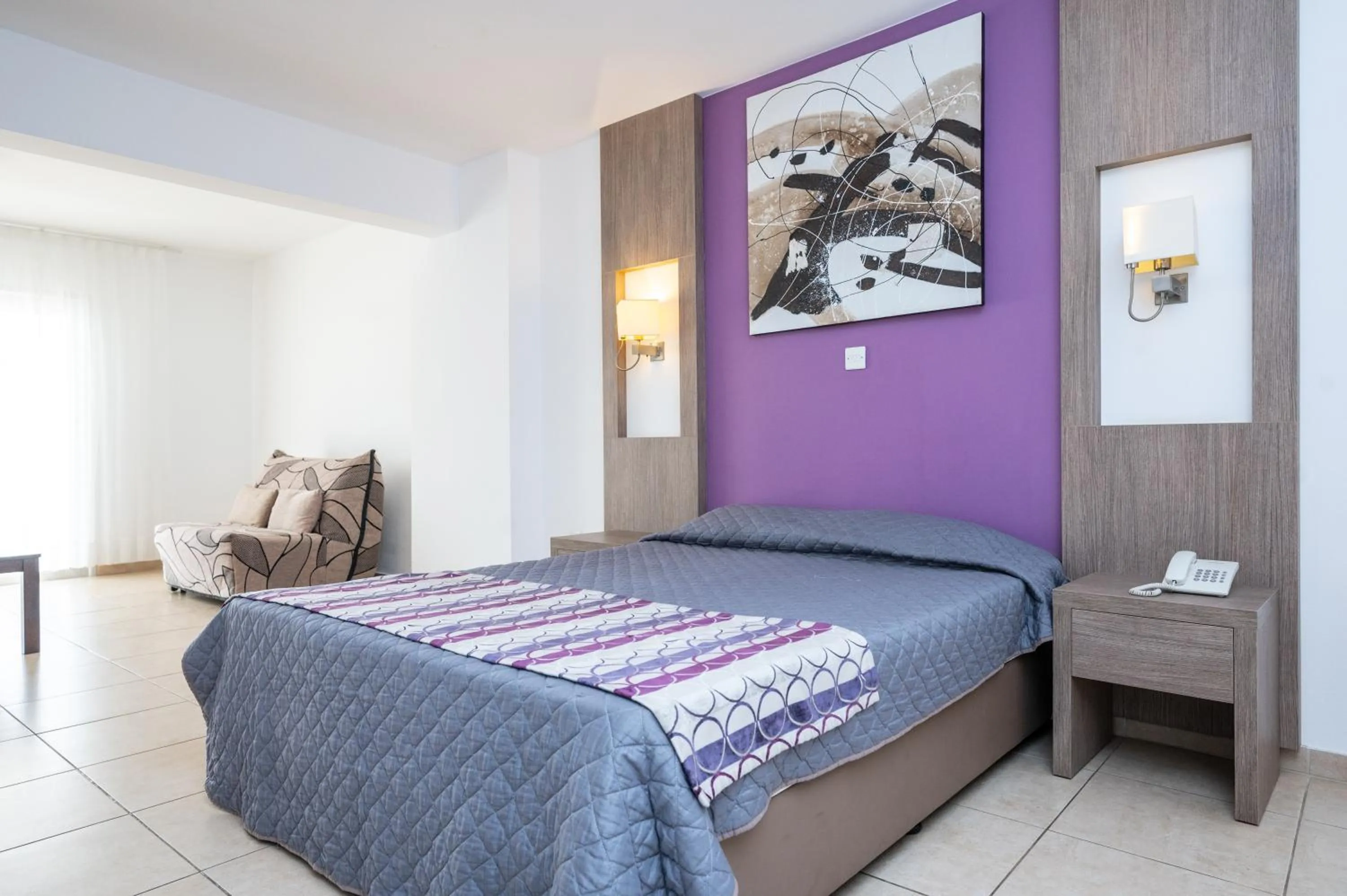 Bed in New Famagusta Hotel & Suites