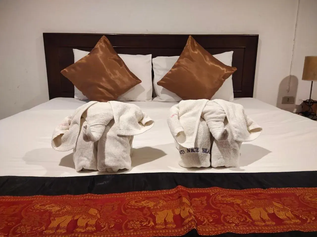 Bed in Lanta Nice Beach Resort - SHA Extra Plus