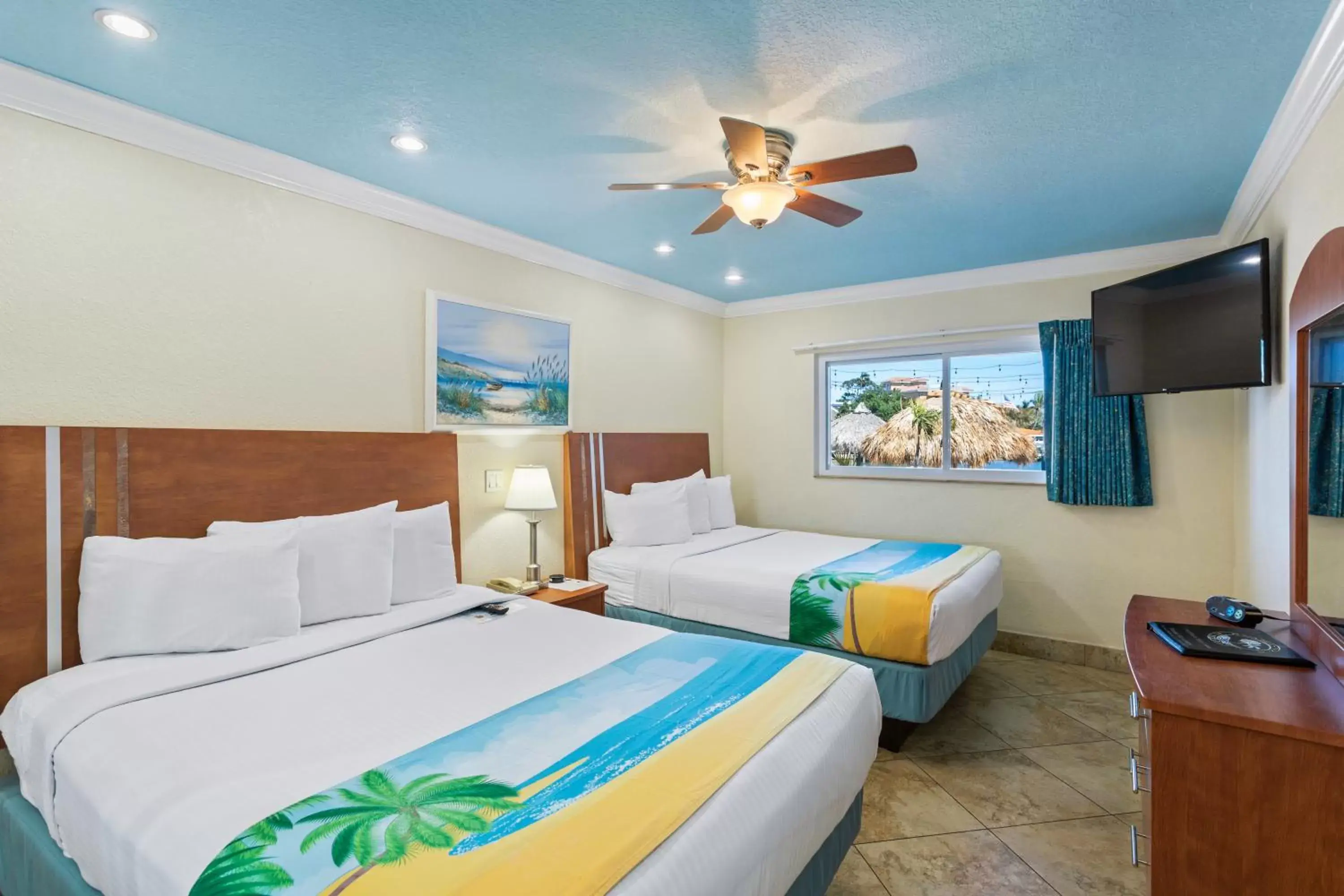 Deluxe One Bedroom Suite: 2 Queen Beds and 1 Sleeper Sofa in Bay Palms Waterfront Resort - Hotel and Marina