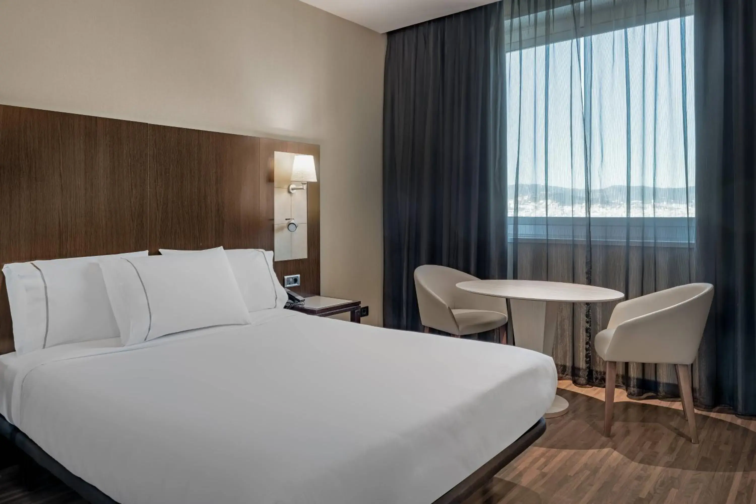 Photo of the whole room, Bed in AC Hotel Barcelona Fórum by Marriott