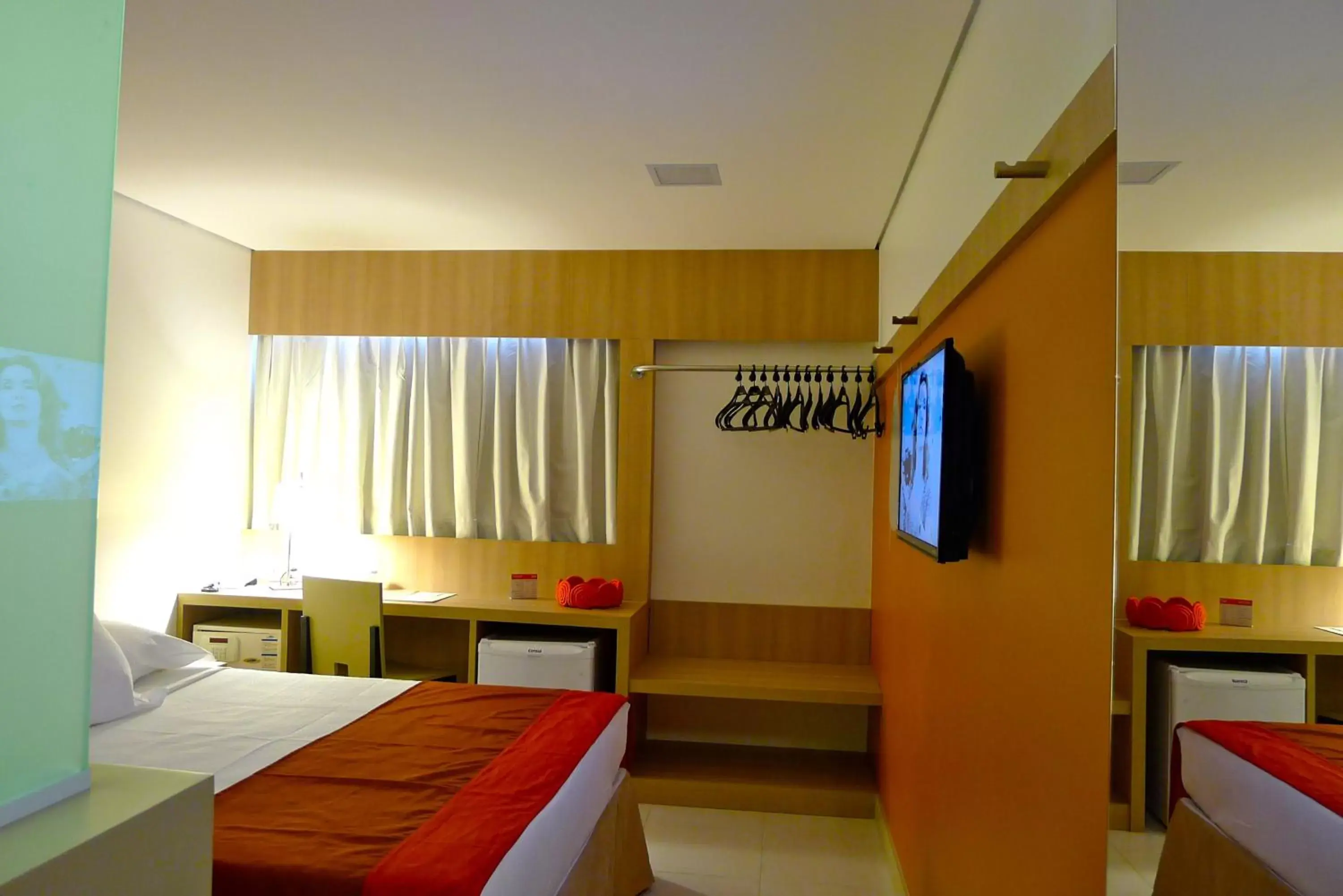 Bedroom, TV/Entertainment Center in Iu-á Hotel