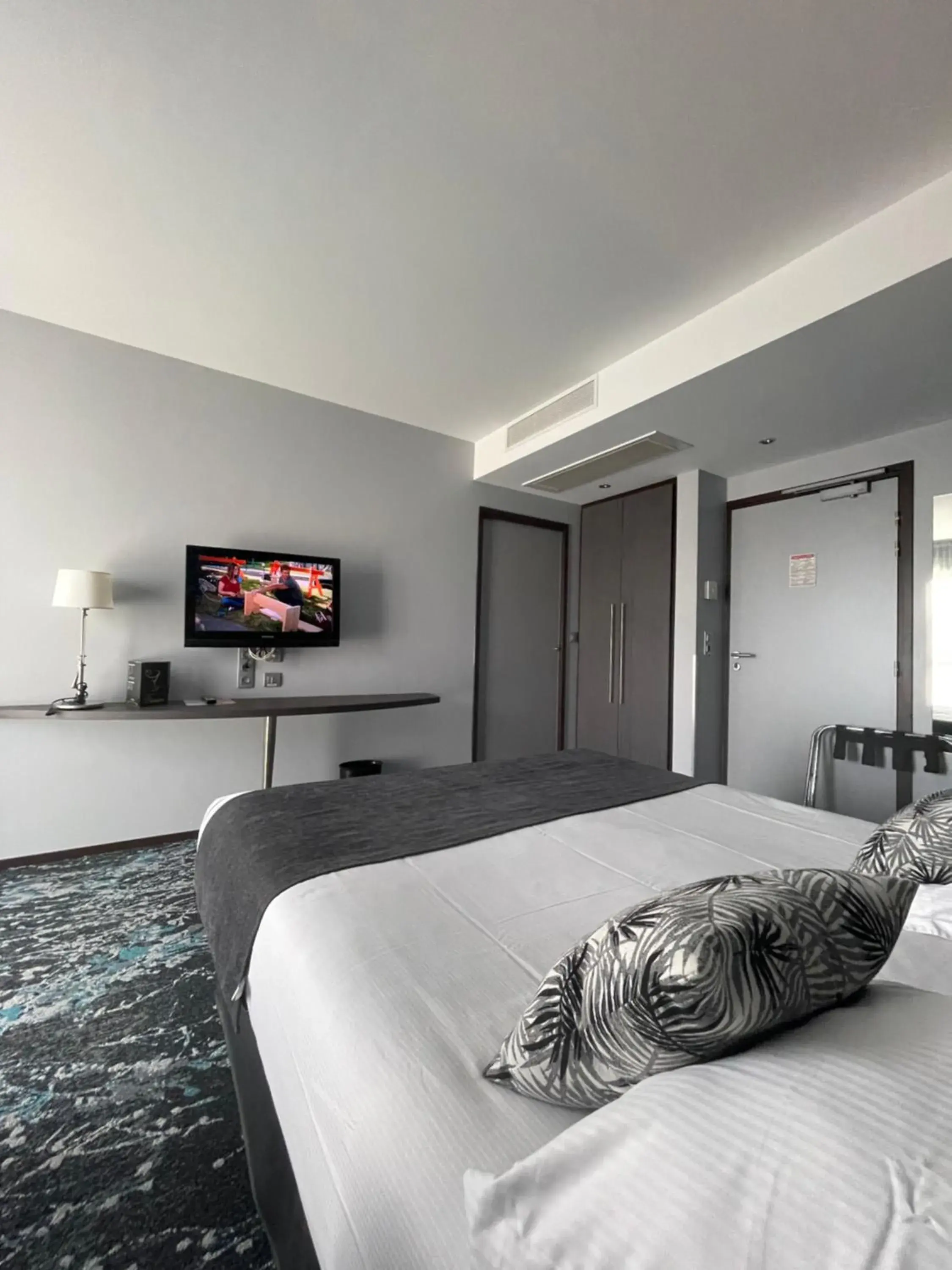 Bed in Hotel Victor Hugo & Spa