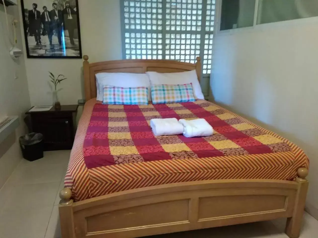 Bed in The Duyan House at Sinagtala Resort