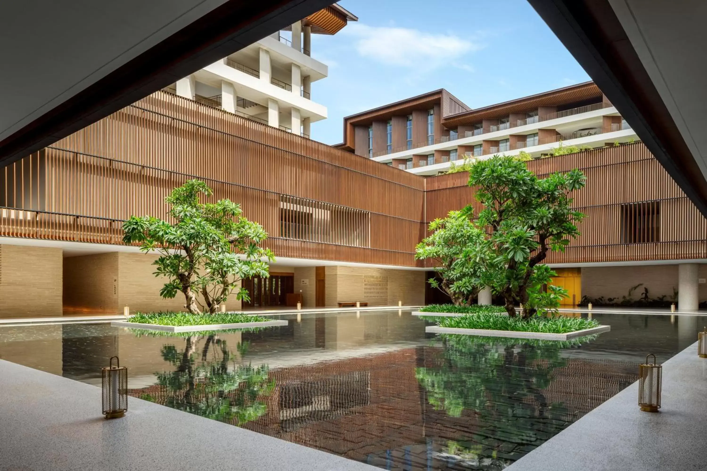 Swimming pool, Property Building in The Taikang Sanya, a Tribute Portfolio Resort