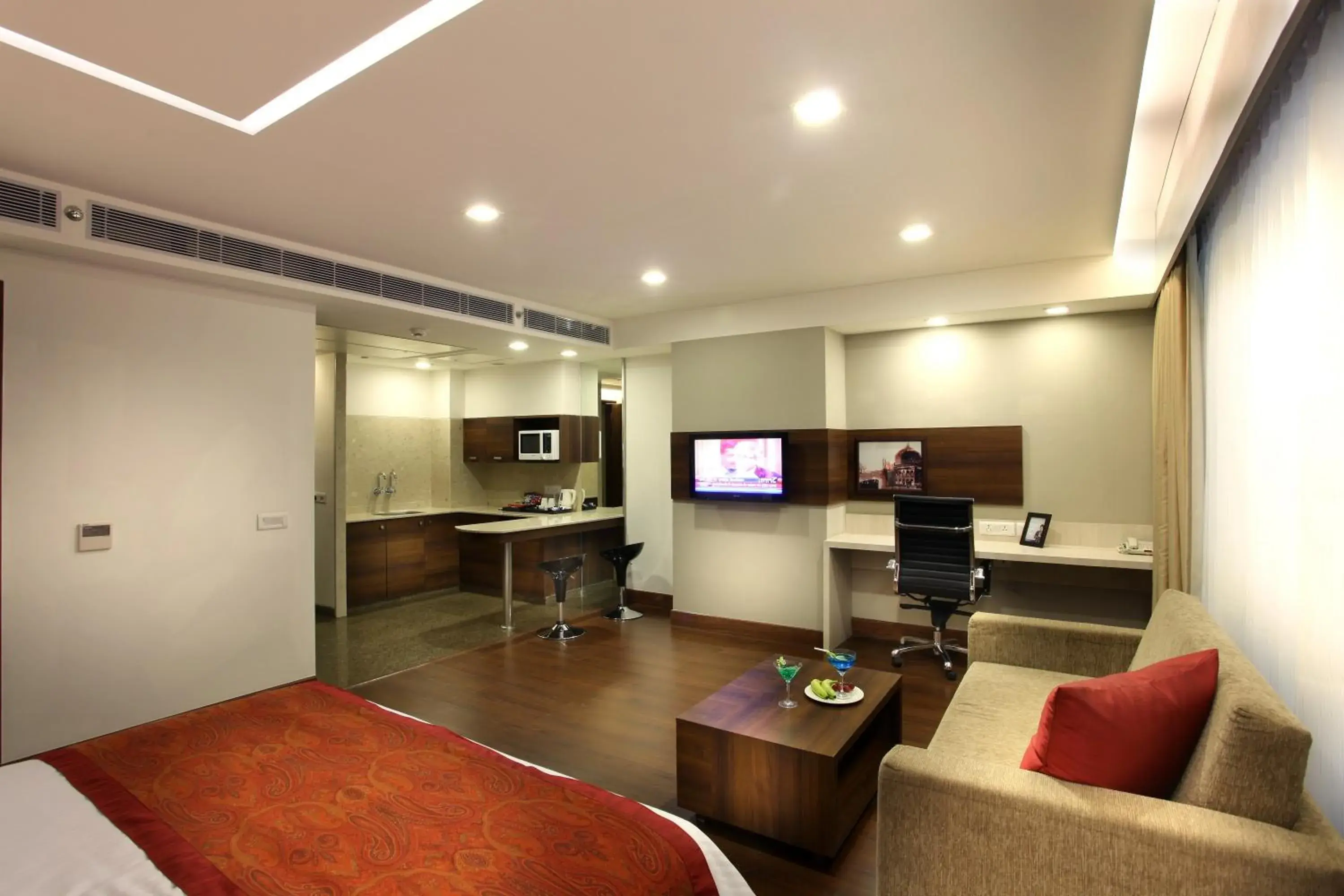 Living room in Mahagun Sarovar Portico Suites Ghaziabad